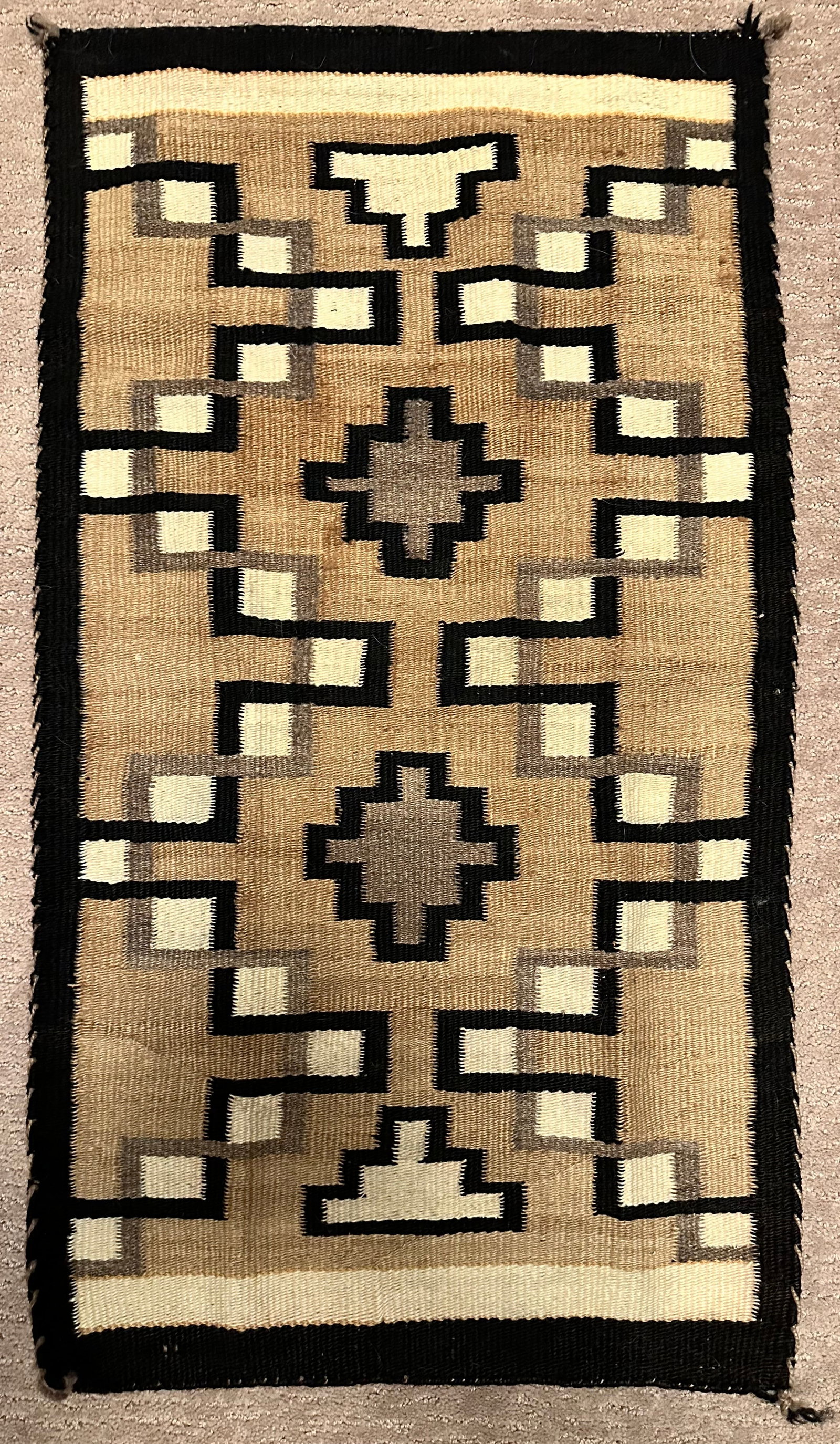Navajo Rug/Saddle Blanket: The color does not vary as shown in the photos, the best match is photo no 1. Actual size is 32" x 18". Dimensions given are for the rug folded for shipping & weight is with the packaging.