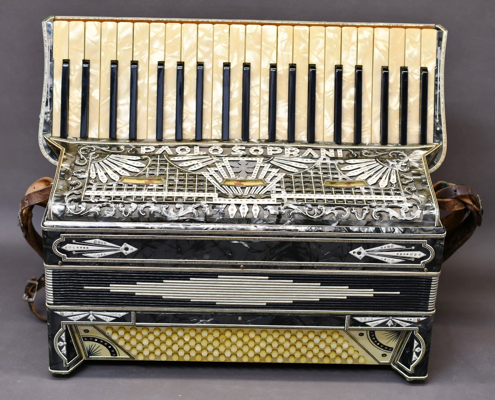 Vintage Paolo Soprani Accordion: Beautiful Made In Italy Accordion in its custom case. Dimensions given are for the item(s) & weight is with the packaging.
