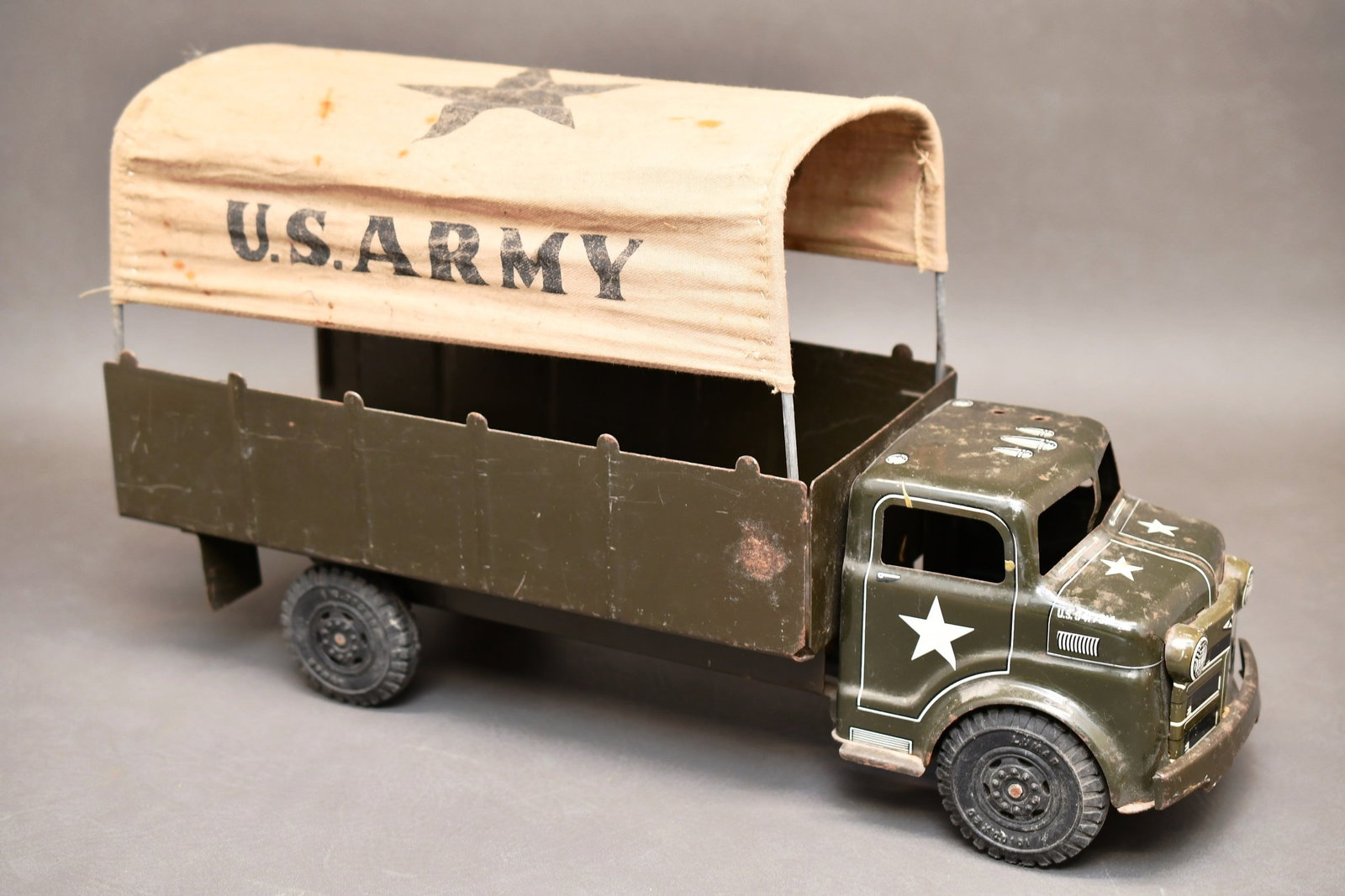 Marx Lumar Press Steel Army Truck 1950's: 1950's Marx US Army 4 wheel 19" long pressed steel Truck. Dimensions given are for the item(s) grouped as prepared for packing & weight is with the packaging.