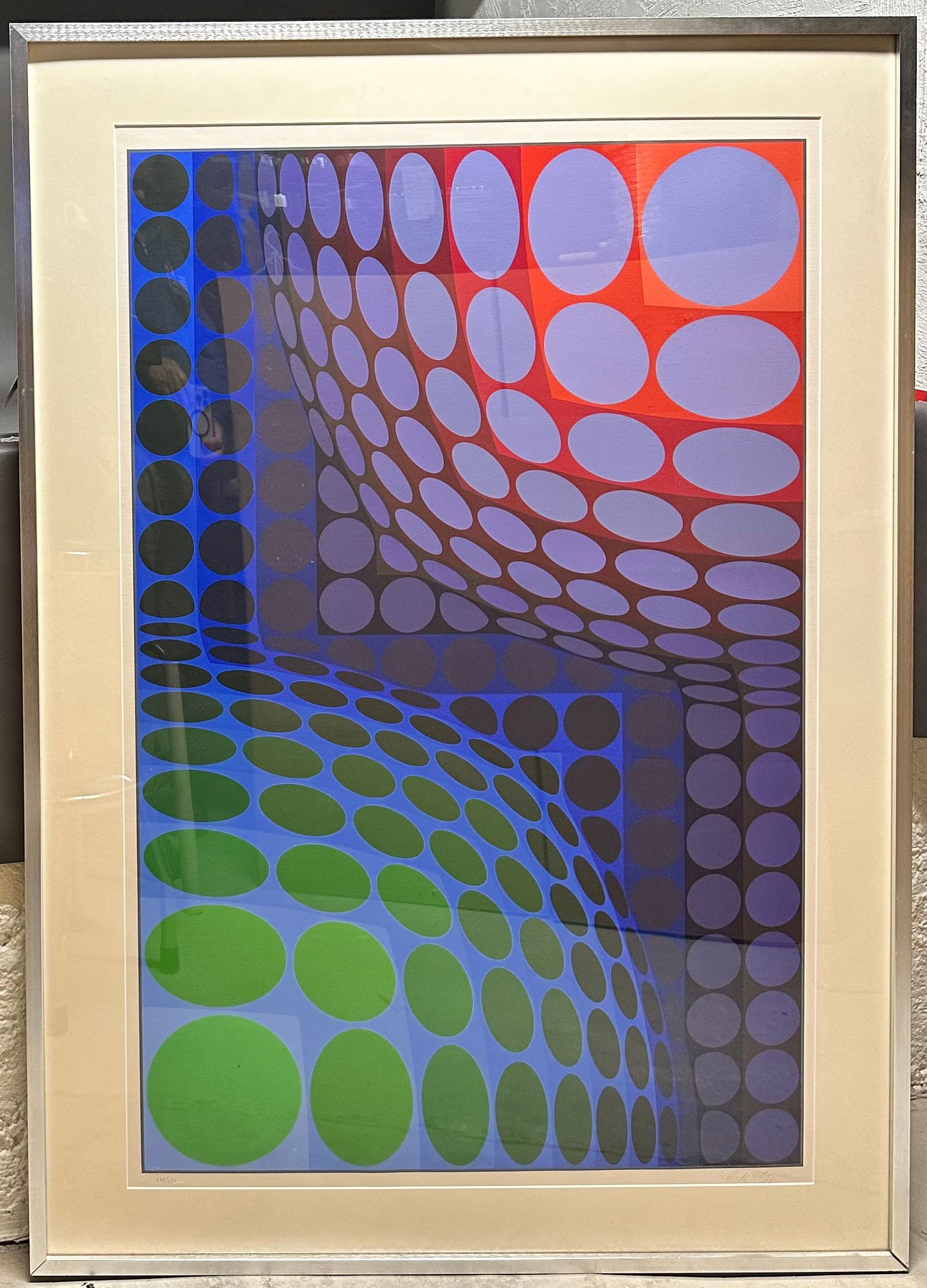 Victor Vasarely "Bi-Vega" Signed & Numbered: Lithograph on woven paper pencil signed, numbered 248/250 & blind stamped. 27" x 41" exposed in the frame, and the metal frame is 34-1/4" x 48-1/4" & is behind plexiglass. IF RQUESTED WE CAN REMOVE TH