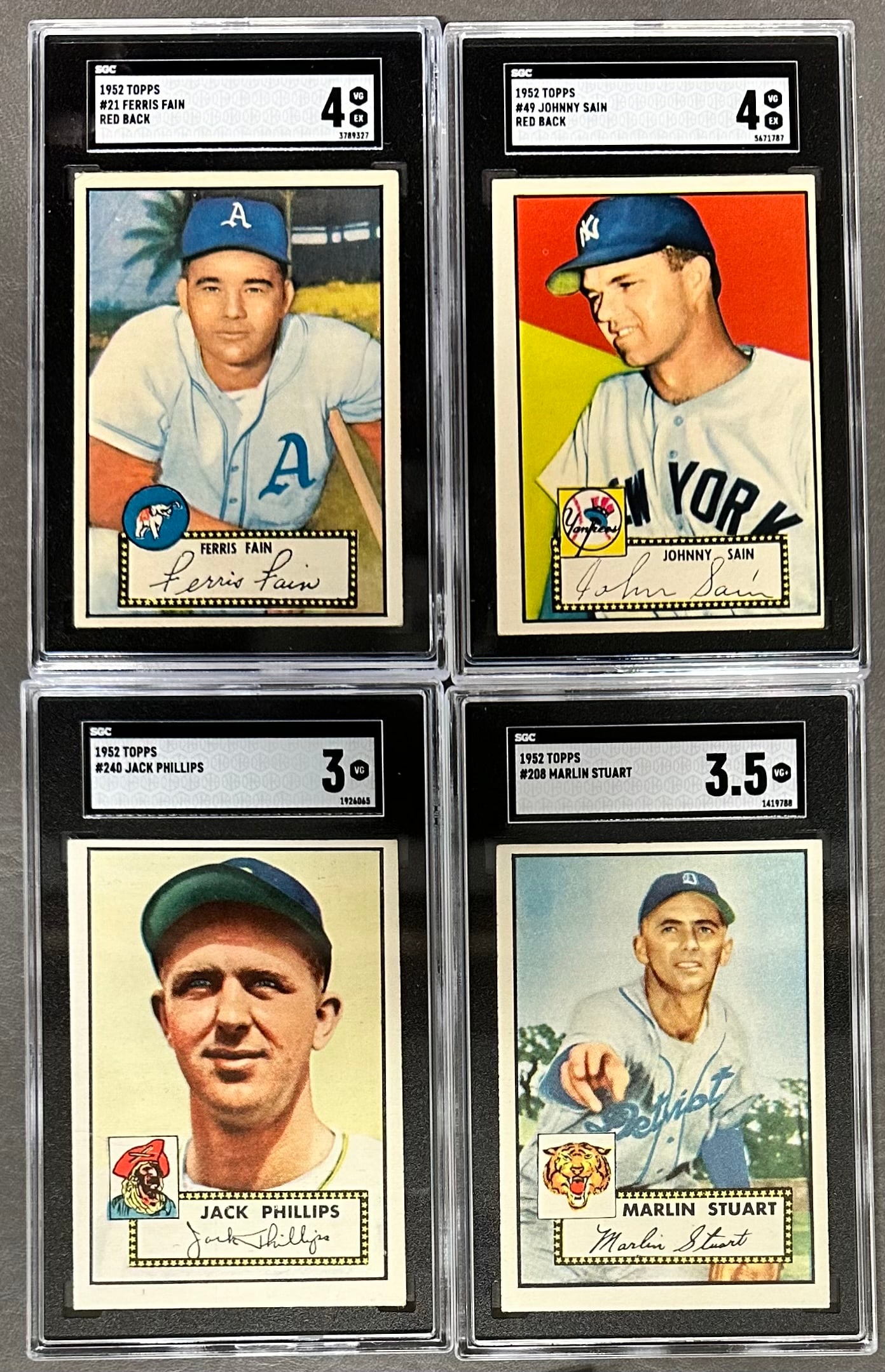 4- 1952 Topps Baseball SGC Graded 3 to 4 Cards: no 21 Ferris Fain Graded 4 SGC no 3789327, no 49 Johnny Sain Red Back Graded 4 SGC no 5671787, no 208 Marlin Stuart Graded 3.5 SGC no 1419788, no 240 Jack Phillips Graded 3 SGC no 1926065.