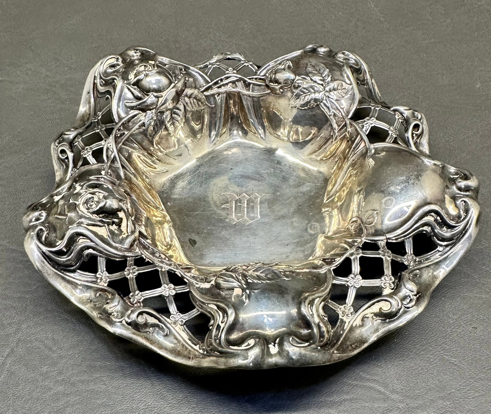 Sterling Silver RW & S Rose pattern candy dish: This R. Wallace & Sons 6-1/2" diameter bowl is a beautiful design. It's markek RW with a stag & S Sterling C680, 7 in. It's monogramed W inside center. The actual weight is 73 grams. Dimensions given 