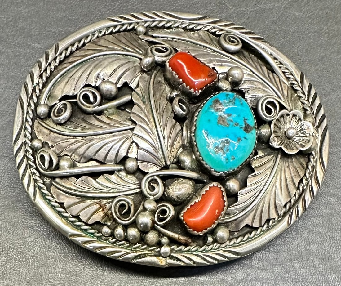Navajo Sterling Silver Belt Buckle GA,: Stamped Sterling & GA for Gilbert Adakai, turquois & Coral 3-1/8" x 2-9/16" 58g. Shipping dimensions given are for the item(s) grouped as prepared for packing & weight is with the packaging.
