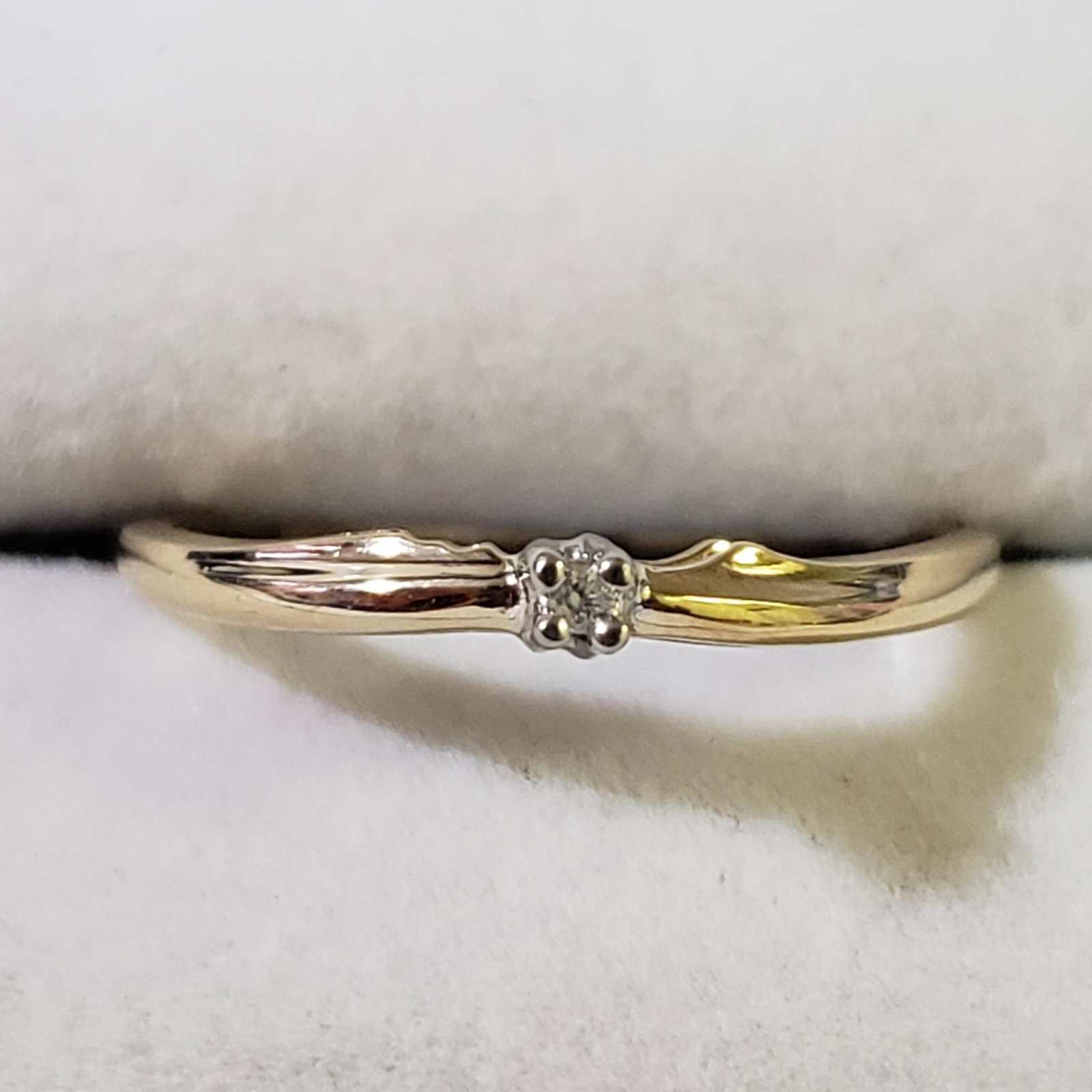 $600 10K Diamond(0.01ct) Ring: 10K Yellow Gold Diamond(0.01ct) Ring (~Size 6.5) (~weight 1.52g), Suggested Retail Value $600 (Estimated Selling Price from $90 to $180)