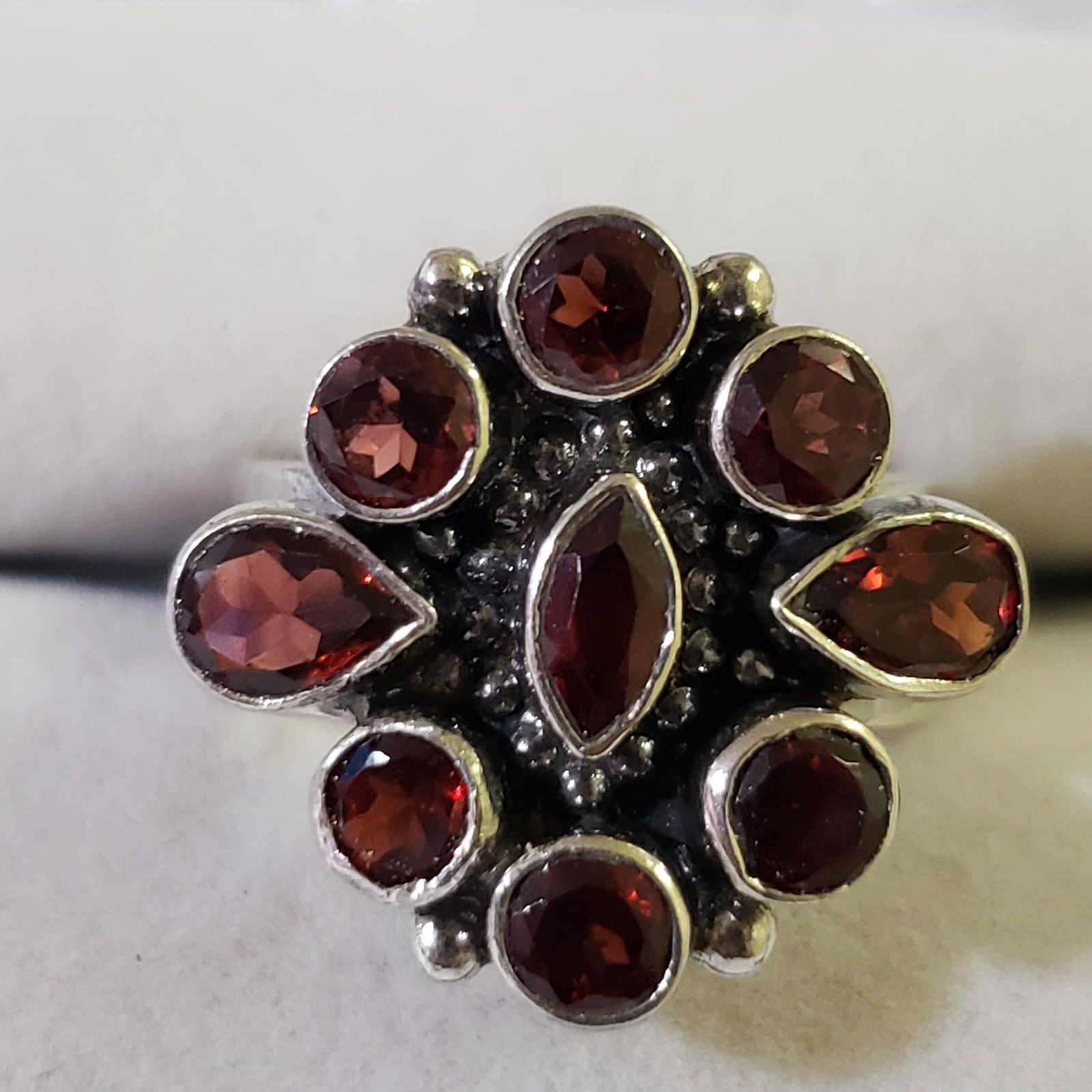 $200 Silver Garnet Ring: Silver Garnet Ring (~Size 7)(Ring is resizable for $40) (~weight 9.82g), Suggested Retail Value $200 (Estimated Selling Price from $30 to $60)