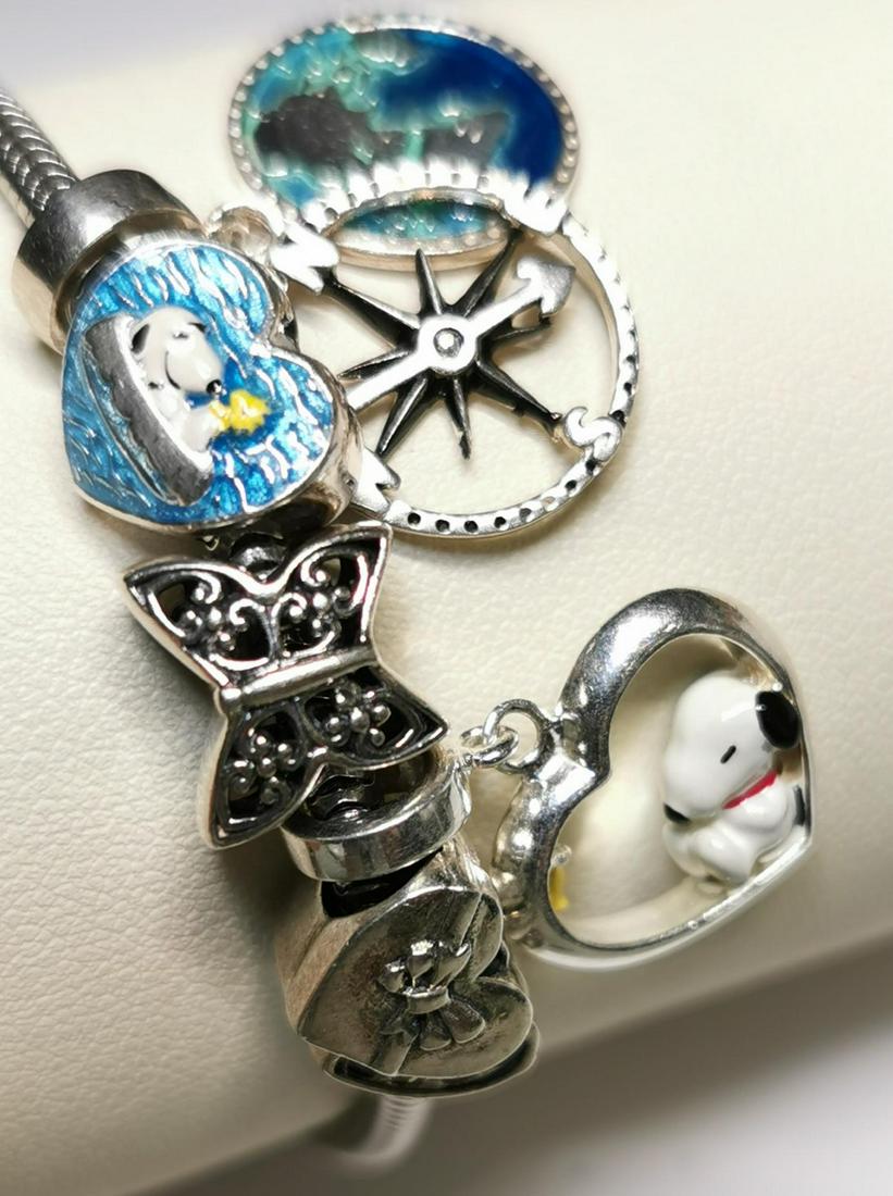 $480 Silver Pandora Style (25.73G) Bracelet: Silver Pandora Style (25.73G) Custom Design, Multiple Bead Types Bracelet (~length 7inches), Suggested Retail Value $480 (Estimated Selling Price from $72 to $144)