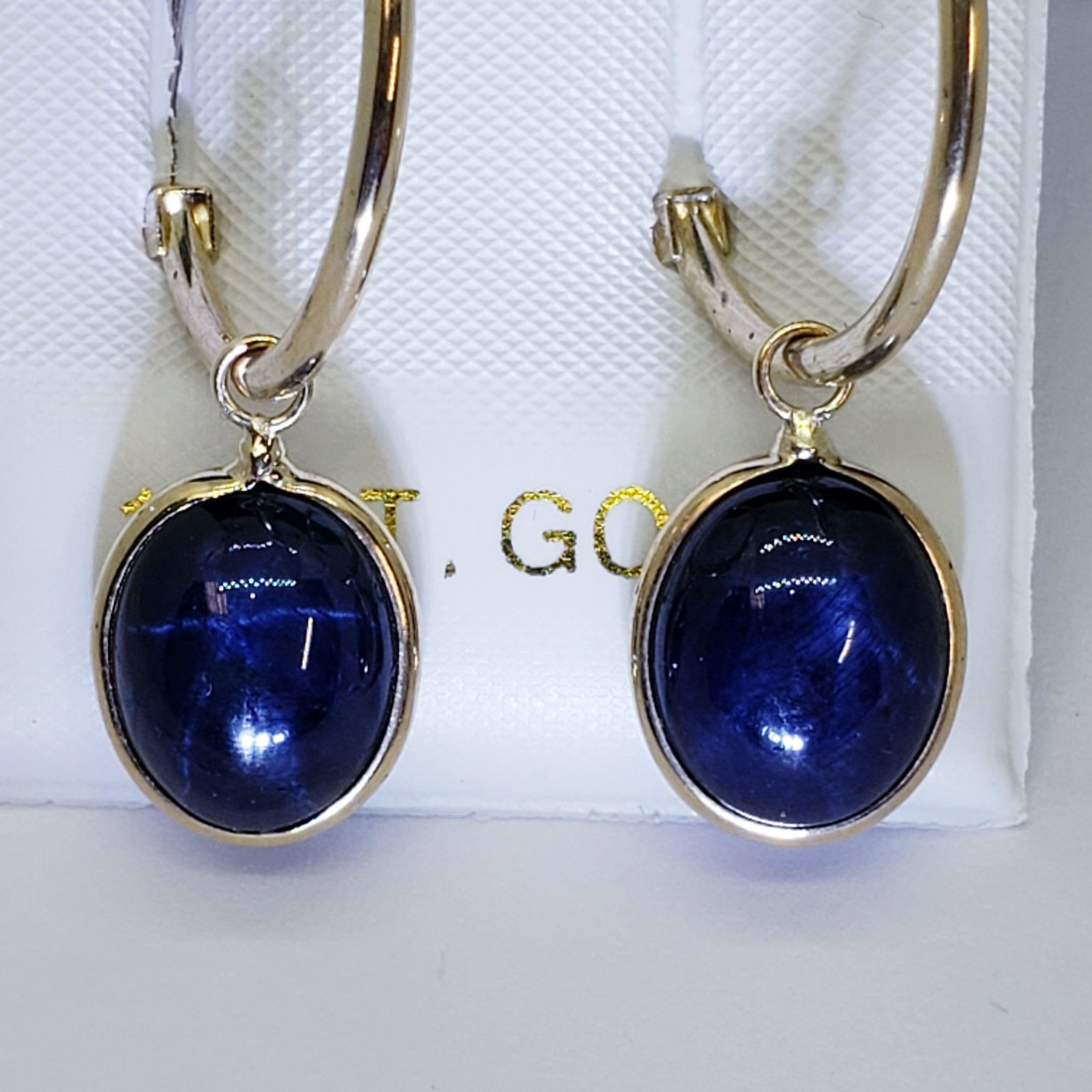 Certified 10K Natural Treated Star Sapphire(12ct): 10K Yellow Gold Natural Treated Star Sapphire(12ct) Earrings (~weight 2.98g) , Made in Canada, Suggested Retail Value: $600