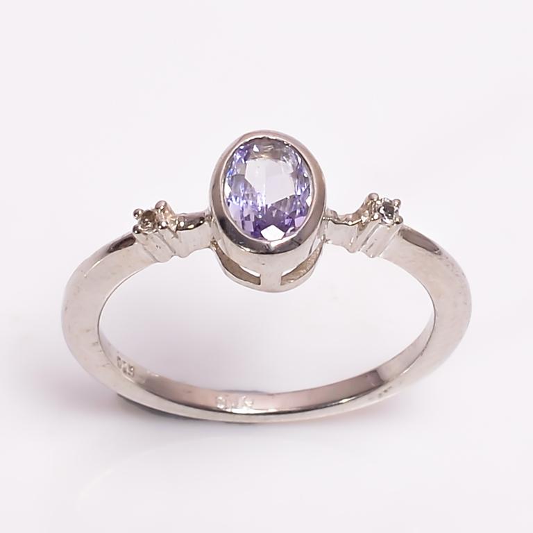 Silver Tanzanite (0.48ct) Ring: Silver Tanzanite (0.48ct) Rhodium Plated Ring (~Size 6)(Ring is resizable for $40) (~weight 1.6g)