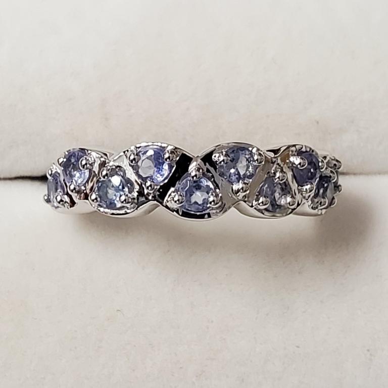 Rhodium Plated St.Silver Tanzanite(1.2ct) Ring: Rhodium Plated St.Silver Tanzanite(1.2ct) Ring (~Size 7)(Ring is resizable for $40) (~weight 3.7g), Suggested Retail Value $240 (Estimated Selling Price from $36 to $72)