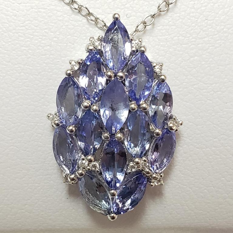 Silver Tanzanite(3ct) Necklace: Silver Tanzanite(3ct) Necklace (~weight 3.6g), Suggested Retail Value $250 (Estimated Selling Price from $36 to $72)