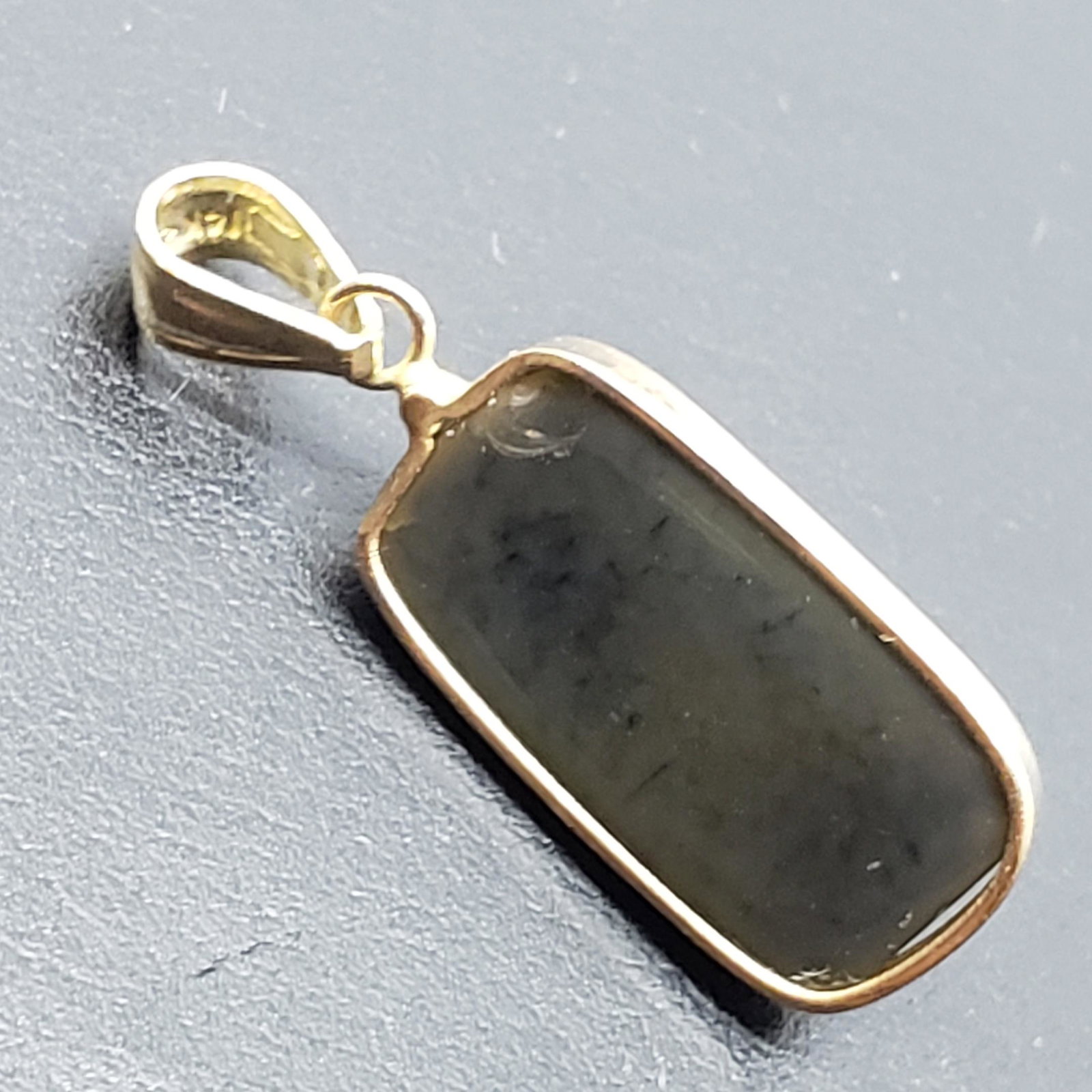 Certified 14K Enhanced Opal(3.8ct) Pendant: 14K Yellow Gold Enhanced Opal(3.8ct) Pendant (~weight 1.23g), Suggested Retail Value: $600
