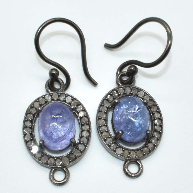 Silver Tanzanite(6.1ct) Earrings: Silver Tanzanite(6.1ct) Rhodium Plated Earrings (~weight 4.35g)
