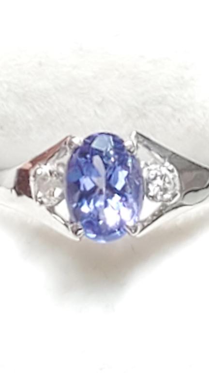 Certified 10K Tanzanite(0.45ct) Diamond(0.04Ct) Ring: 10K White Gold Tanzanite(0.45ct) Diamond(0.04Ct) Ring (~Size 6) (~weight 1.18g), Made in Canada, Suggested Retail Value: $400