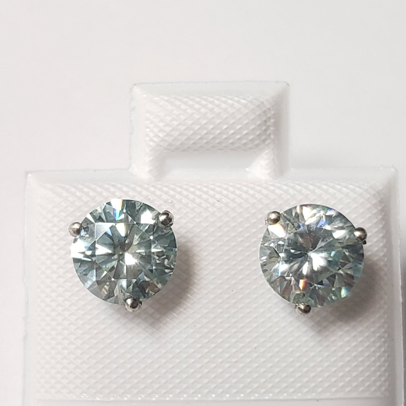 Certified14K Vivid Blue Green Moissanite(2ct) Earrings: 14K White Gold Vivid Blue Green Moissanite(2ct) Earrings (~weight 0.98g), Made in Canada, Suggested Retail Value:$500