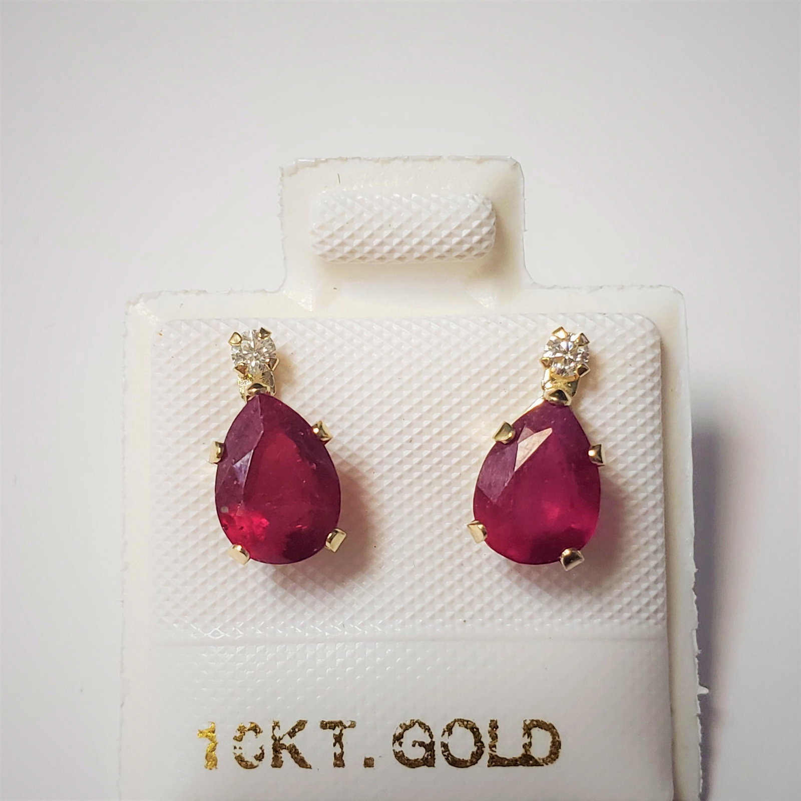 $360 10K Ruby(1.04ct) Moissanite(0.06ct) Earrings: 10K Yellow Gold Ruby(1.04ct) Moissanite(0.06ct) Earrings, Made in Canada, Suggested Retail Value $360