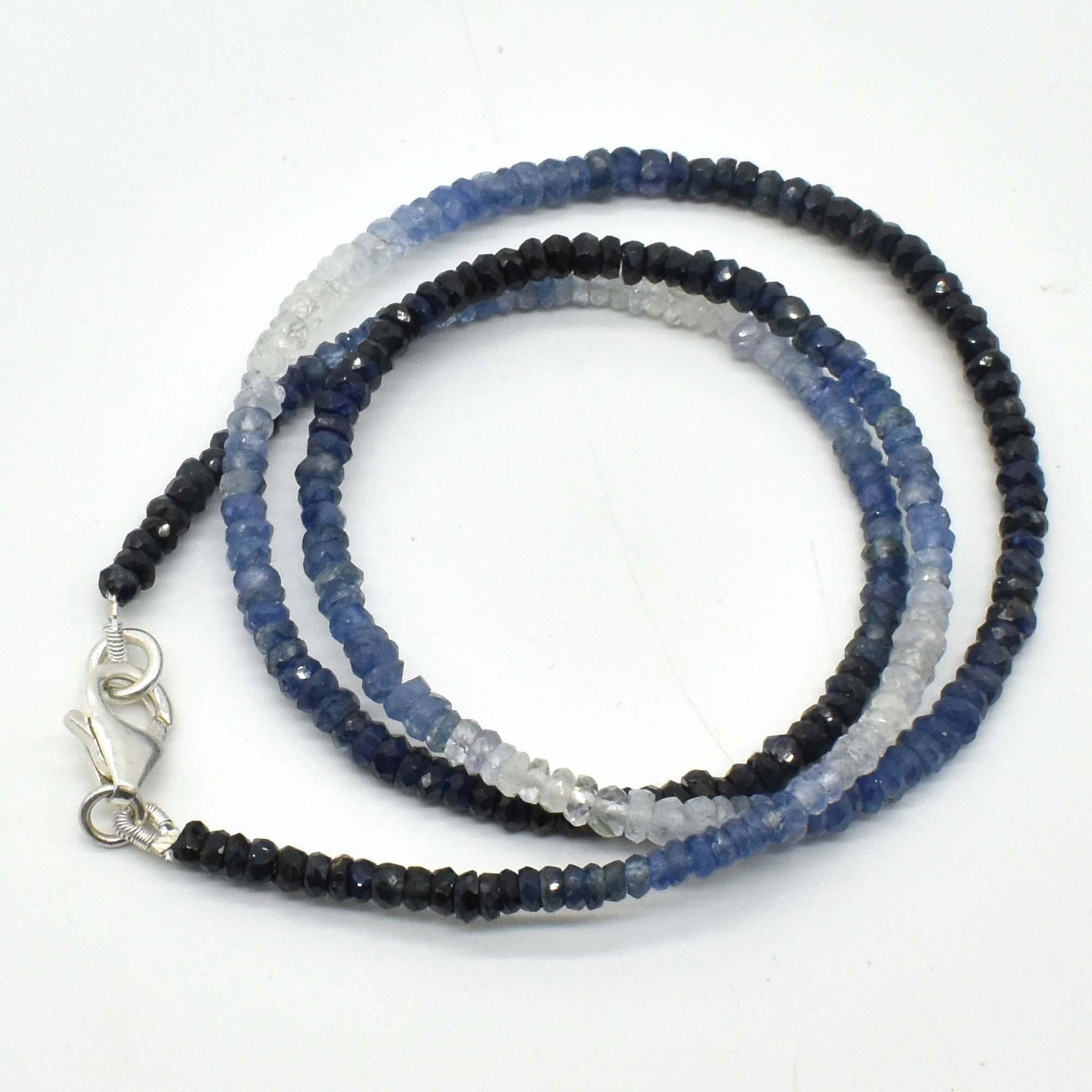 Silver Certified Blue Sapphire(41.8ct) Necklace: Silver Certified Blue Sapphire(41.8ct) Shaded Necklace (~Size 0) (~length 0 inches) (~weight 9.4g)