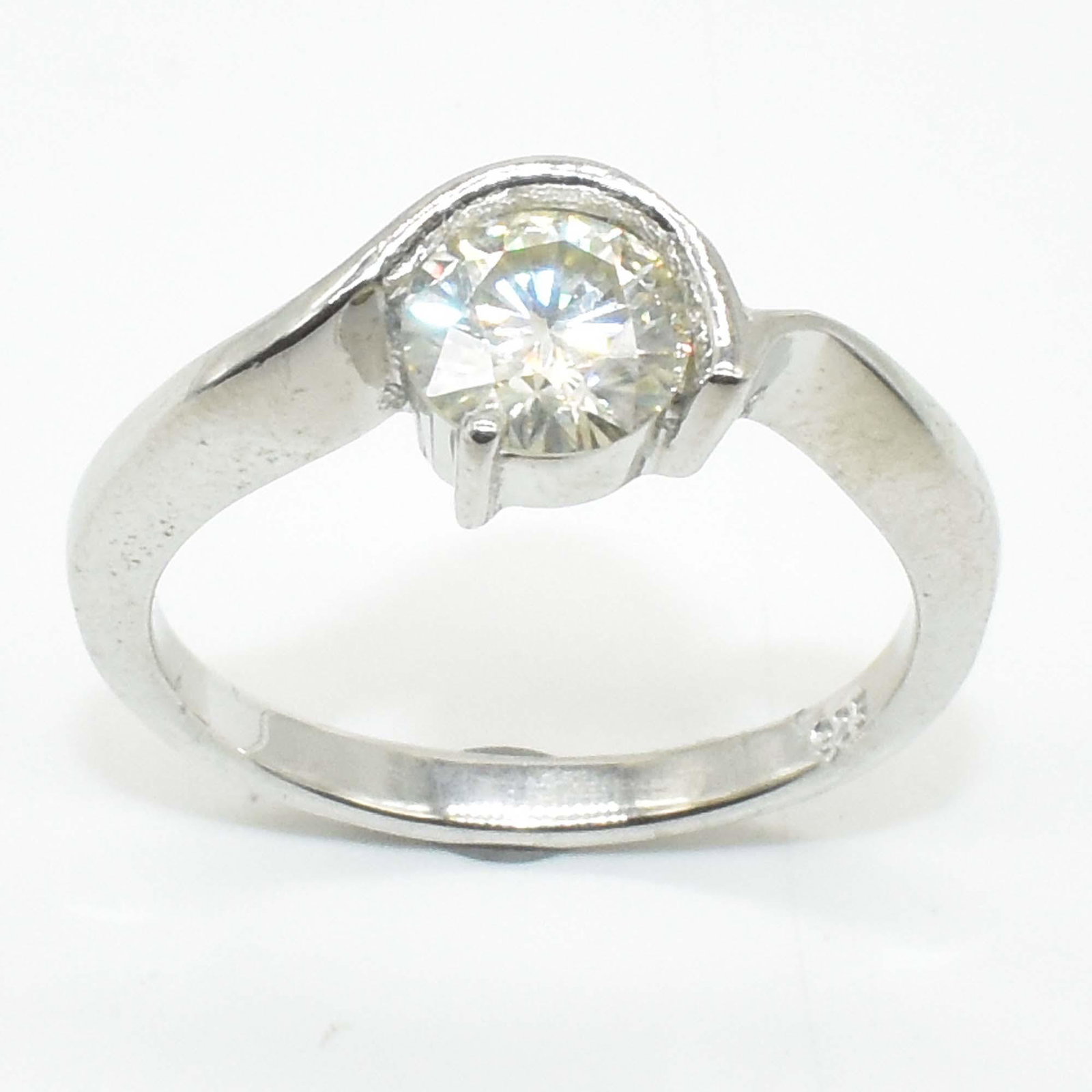 Silver Moissanite ( Round 7X7 Mm)(1.2ct) Ring: Silver Moissanite ( Round 7X7 Mm)(1.2ct) Rhodium Plated Test And Looks Better Than Diamond Ring (~Size 0) (~length 0 inches) (~weight 2.7g)