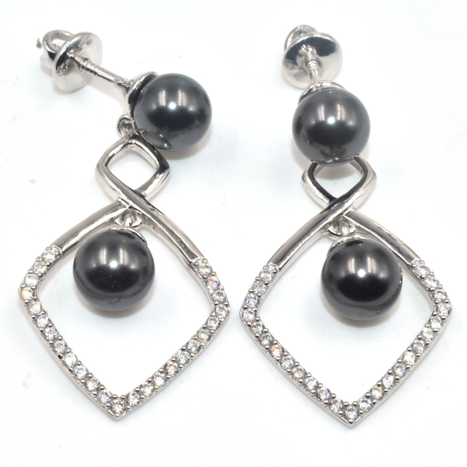 Silver Black Pearl Cz(7.9ct) Earrings: Silver Black Pearl Cz(7.9ct) Rhodium Plated Earrings (~Size 0) (~length 0 inches) (~weight 9.2g)