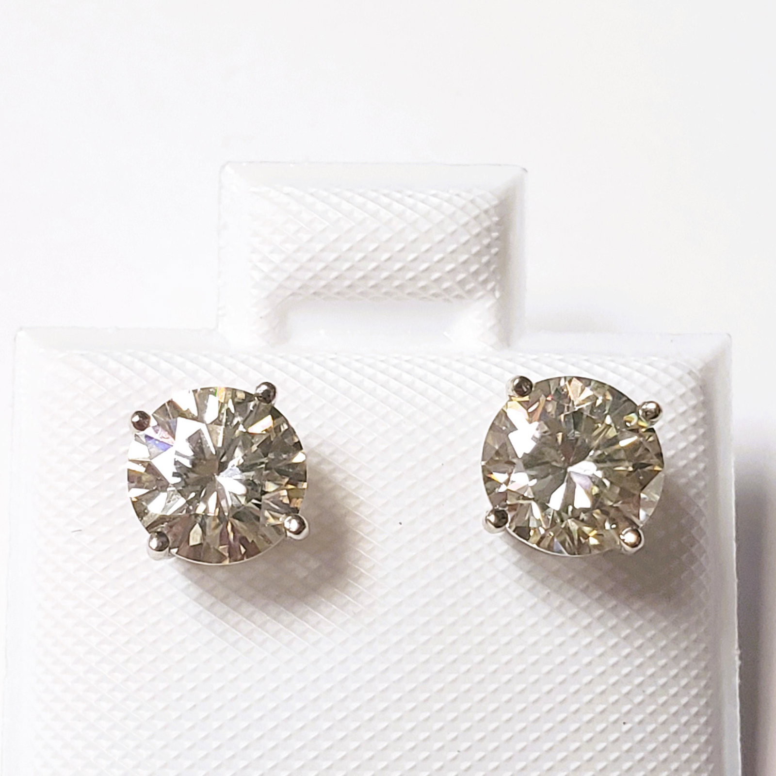 Certified14K White Moissanite(1.42ct) Earrings: 14K White Gold White Moissanite(1.42ct) Earrings (~weight 1g), Made in Canada, Suggested Retail Value:$600