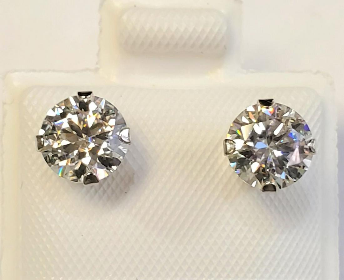 Certified10K Moissanite(1.52ct) Earrings: 10K White Gold Moissanite(1.52ct) Stud Earrings (~weight 0.72g), Made in Canada, Suggested Retail Value:$400