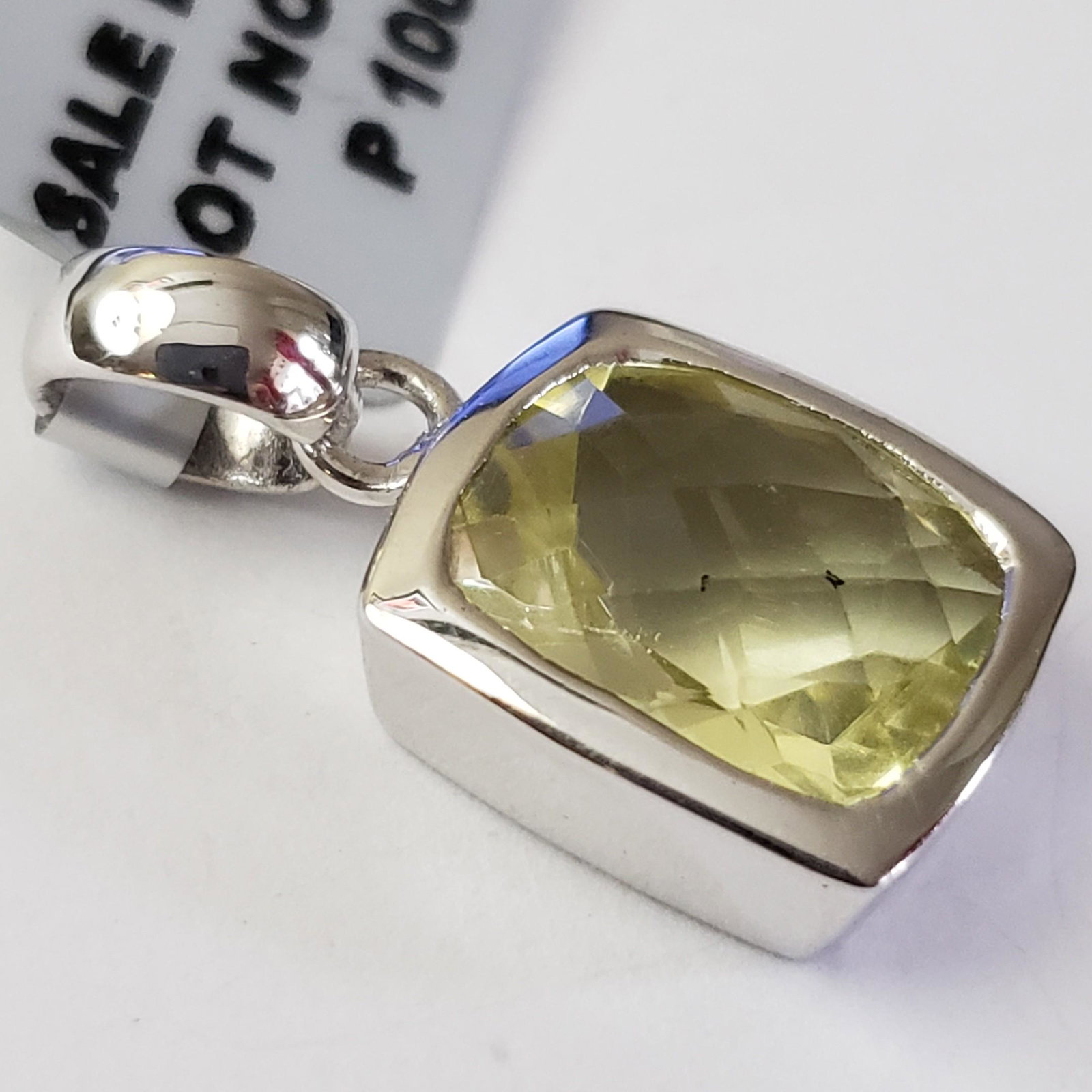 $200 Silver Lemon Quartz(4.05ct) Pendant: Silver Lemon Quartz(4.05ct) Pendant (~Size 0) (~length 0 inches) (~weight 4g), Suggested Retail Value $200