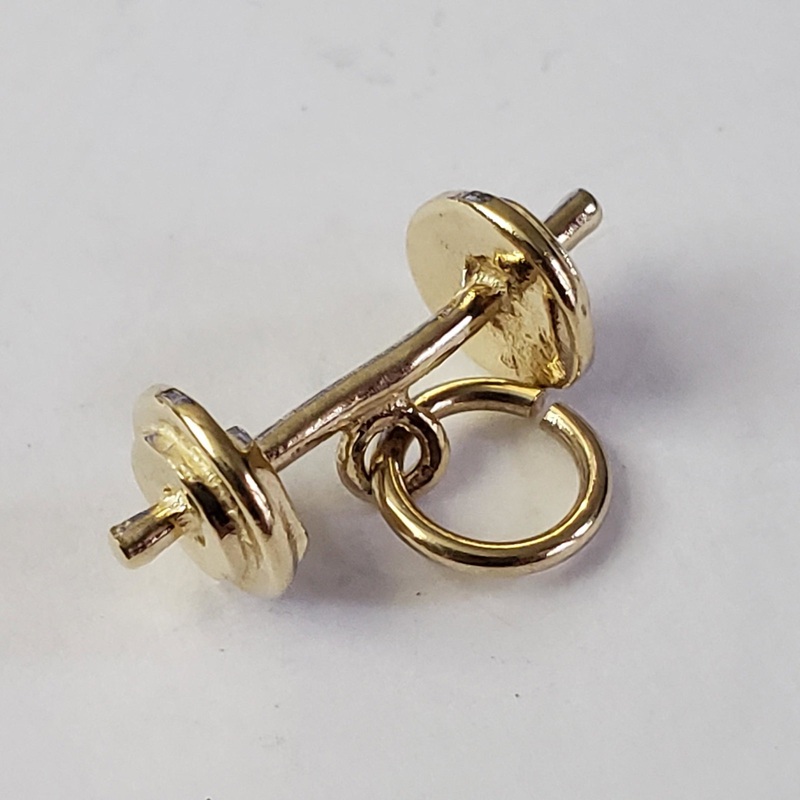 $600 10K Pendant: 10K Yellow Gold Pendant (~Size 0) (~length 0 inches) (~weight 1.1g), Suggested Retail Value $600