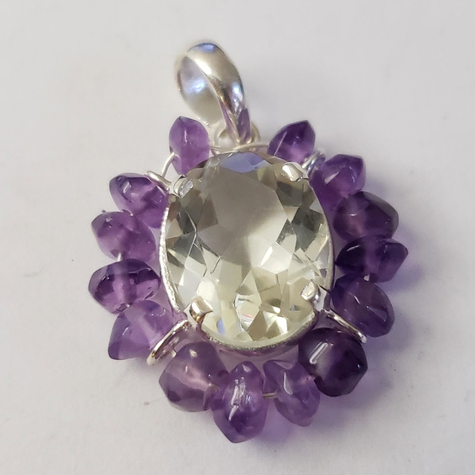 $120 Silver Green Amethyst Amethyst Pendant: Silver Green Amethyst Amethyst Pendant (~Size 0) (~length 0 inches) (~weight 3g), Suggested Retail Value $120