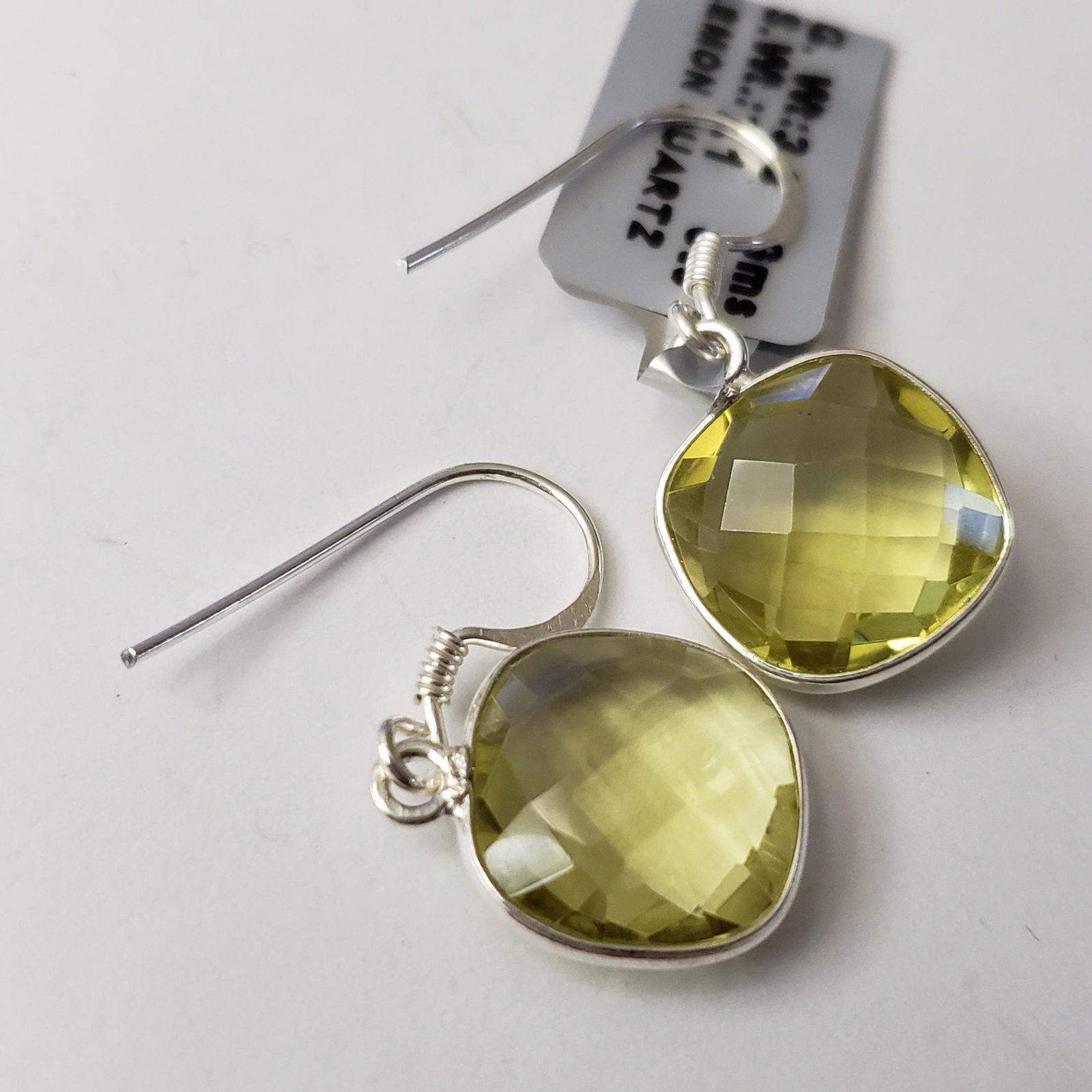 $140 Silver Lemon Quartz(7.1ct) Earrings: Silver Lemon Quartz(7.1ct) Earrings (~Size 0) (~length 0 inches) (~weight 3.3g), Suggested Retail Value $140
