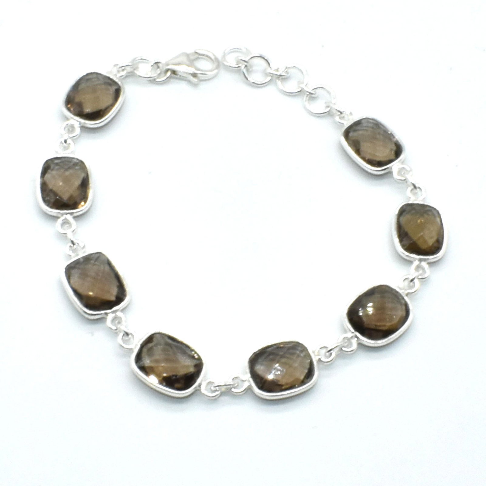 $220 Silver Smokey Quartz(12.8ct) Bracelet: Silver Smokey Quartz(12.8ct) Bracelet (~Size 0) (~length 7.5 inches) (~weight 8.45g), Suggested Retail Value $220