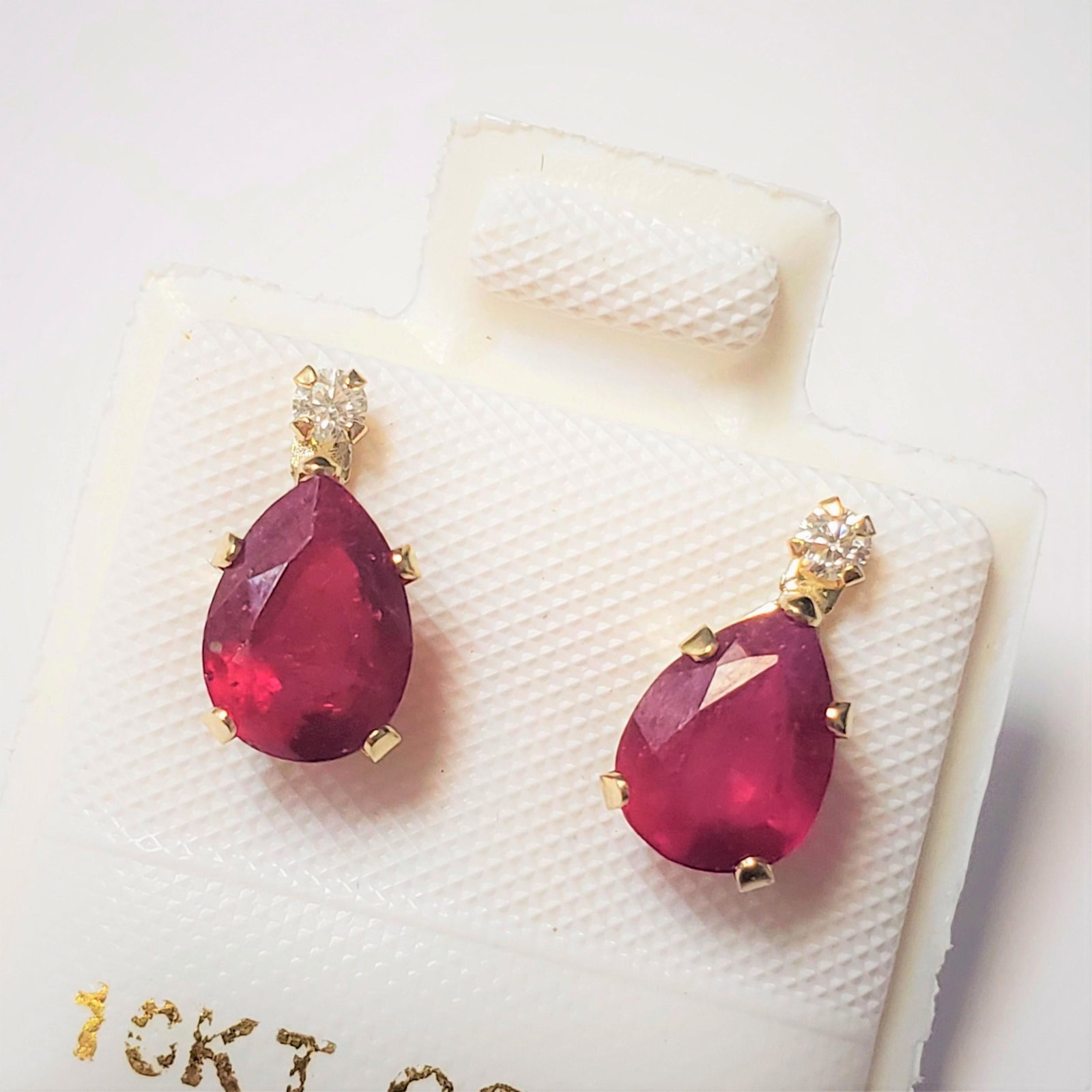 $400 10K Ruby(1.8ct) Moissanite(0.05ct) Earrings: 10K Yellow Gold Ruby(1.8ct) Moissanite(0.05ct) Earrings, Made in Canada, Suggested Retail Value $400