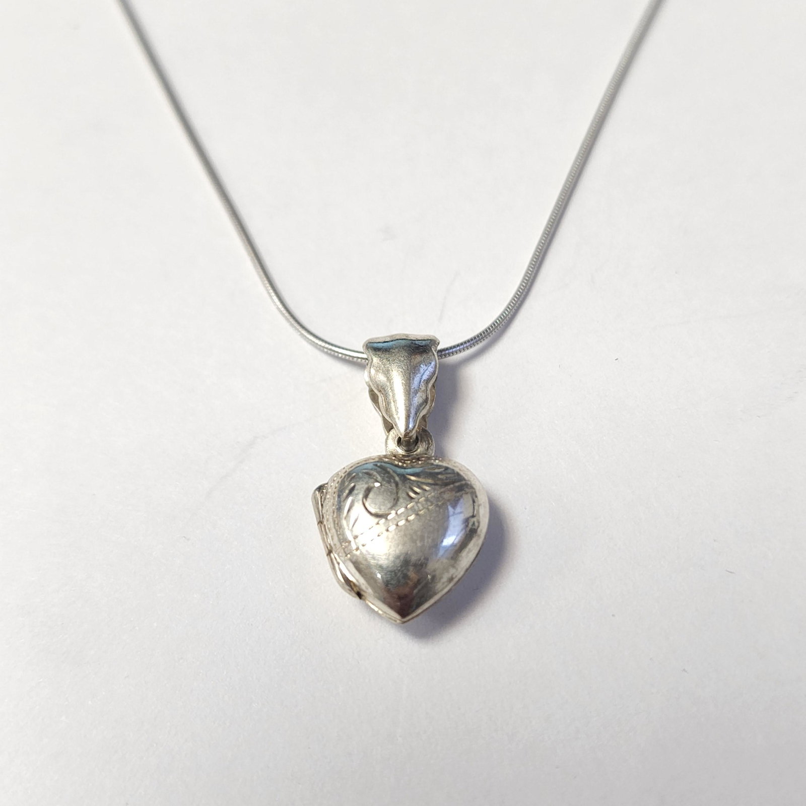 $60 Silver Locket 16" 5G Necklace: Silver Locket 16" 5G Necklace, Suggested Retail Value $60