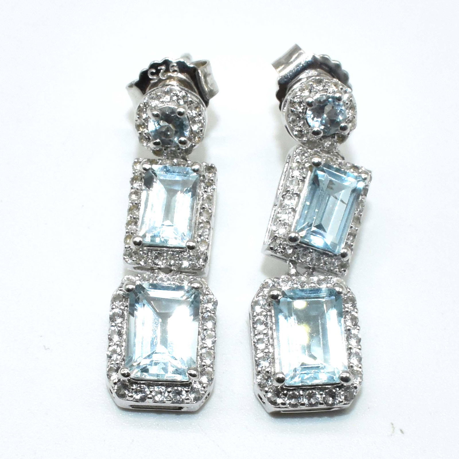 $220 Silver Blue Topaz(4.25ct) Earrings: Silver Blue Topaz(4.25ct) Rhodium Plated Earrings (~Size 0) (~length 0 inches) (~weight 4.45g), Suggested Retail Value $220