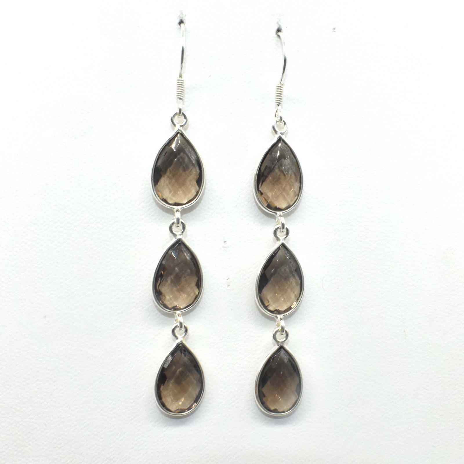 $180 Silver Smokey(19.9ct) Earrings: Silver Smokey(19.9ct) Earrings Earrings (~Size 0) (~length 0 inches) (~weight 8.4g), Suggested Retail Value $180
