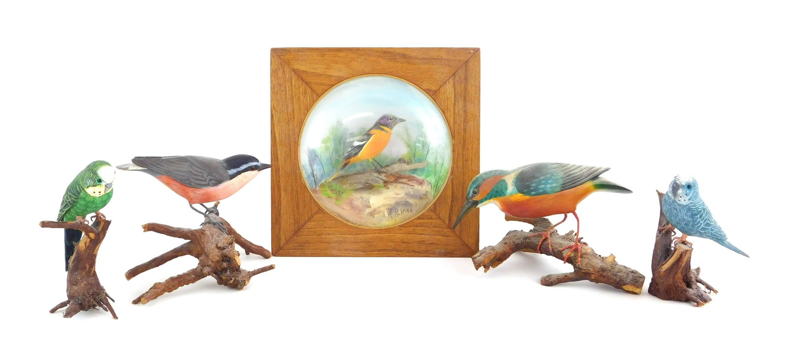 Five bird carvings, including one framed behind glass,: Five bird carvings, including one framed behind glass, details include: one diorama with Baltimore Oriole on branch, signed A. Peltier, hand-painted background, frame size: 7" h. x 7" w.; and four bir