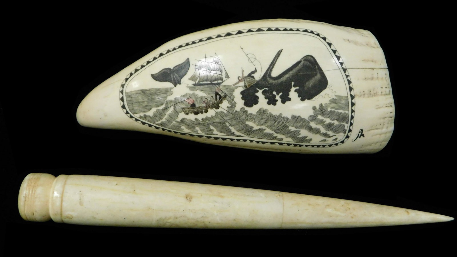 Scrimshaw whale's tooth and a sail maker's tool:: Scrimshaw whale's tooth and a sail maker's tool: Scrimshaw whale's tooth depicting whaling scene, nicely carved and decorated with polychrome accents, artist signed "JH" LR, wear consistent with age a