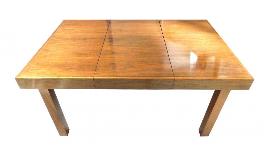 George Nelson (American, 1906-1986) design for Herman: George Nelson (American, 1906-1986) design for Herman Miller "Primavera" dining table, c. 1950, walnut, beveled table top over four straight slightly recessed block legs, two table leaves folded and s