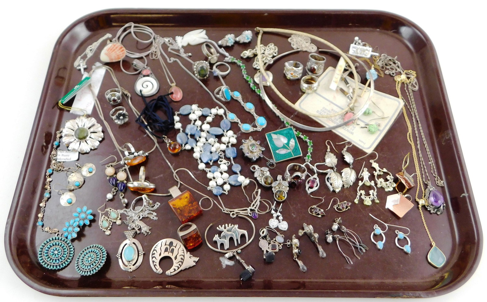 SILVER JEWELRY: 35+ Pieces, most marked sterling, as: SILVER JEWELRY: 35+ Pieces, most marked sterling, as well as Mexico, Thailand, Ireland, etc., items of interest include: necklace and earring set by Mexican maker Felix Perry, disc form with inset blu