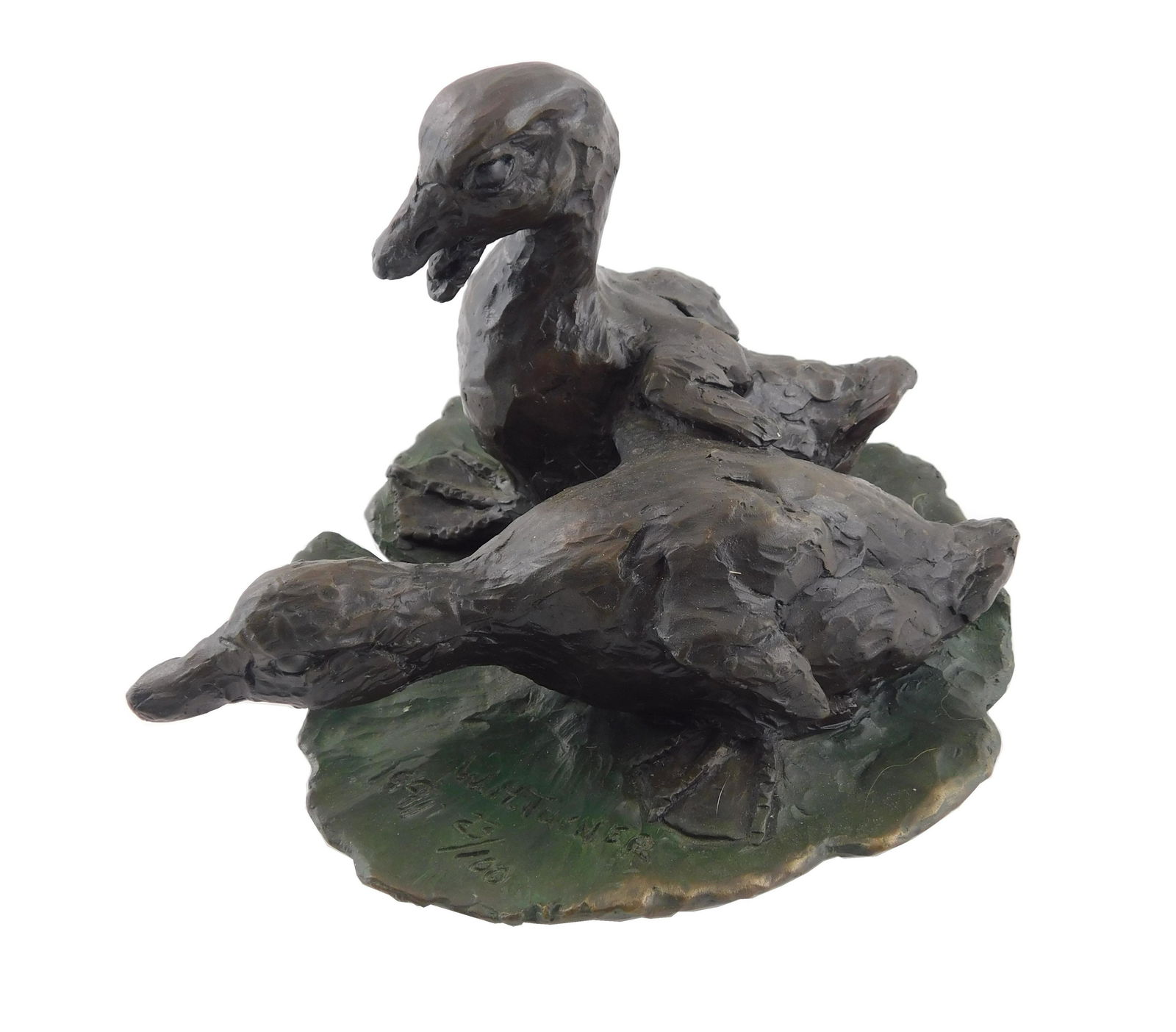 William Turner (American, b. 1943), "Mallard: William Turner (American, b. 1943), "Mallard Ducklings", 1991, bronze sculpture, ed. 23/100, depicts pair of ducklings on lily pad, one upright and one curiously leaning forward, incised signature, da