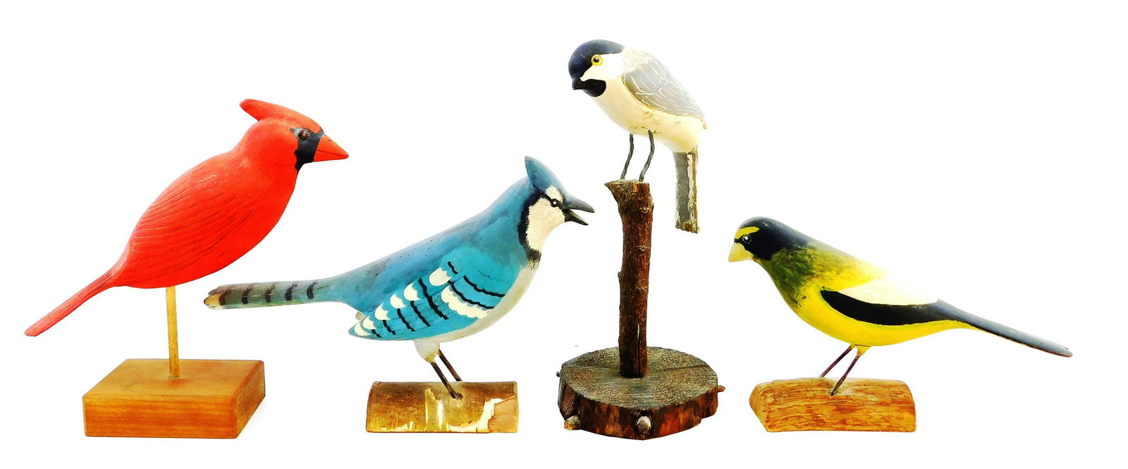 Four Maine carvings of birds, late 20th C., all signed (1 of 3)