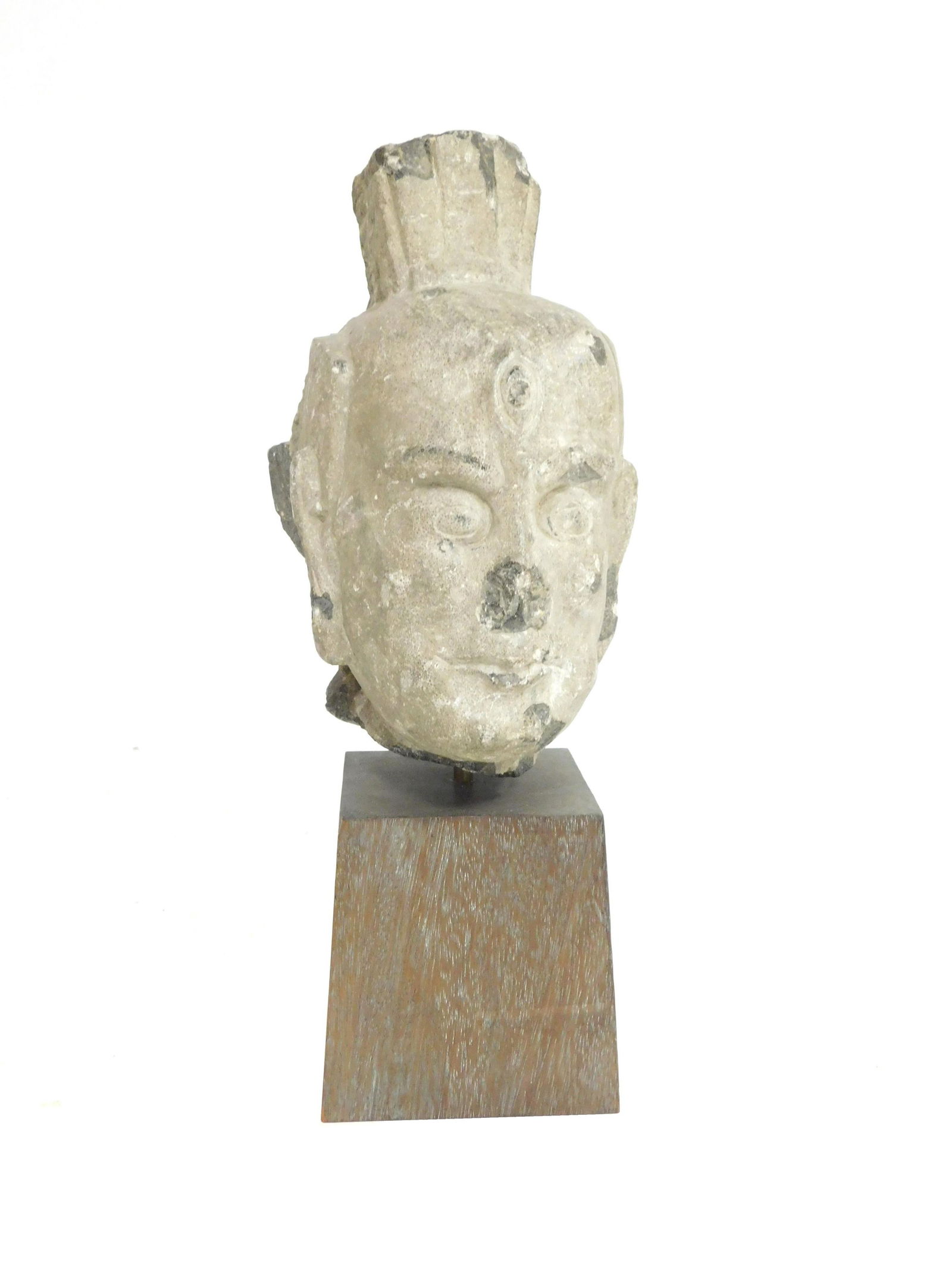 Carved stone head of a Lokapala, Chinese, Tang style, (1 of 5)