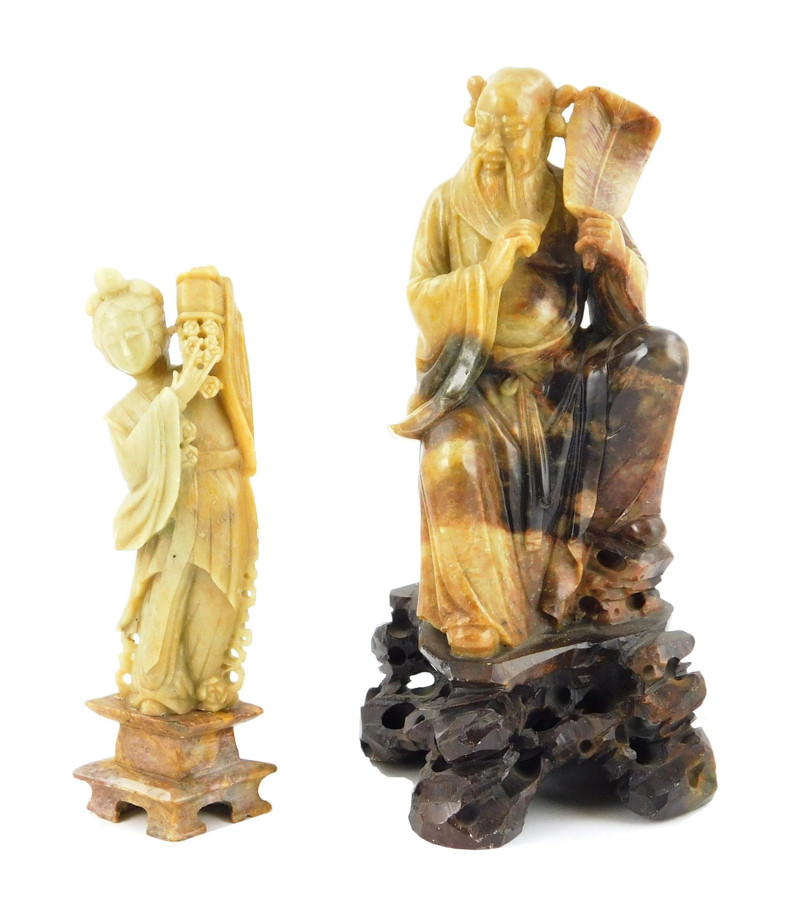 Two hardstone carvings, Chinese, 20th C., one of a male (1 of 2)