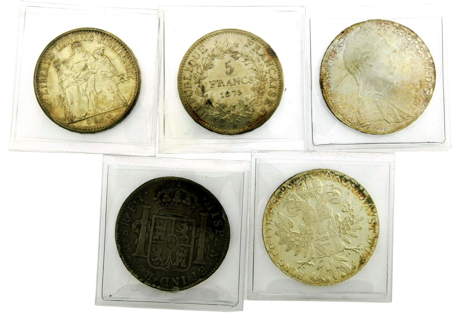 COINS: Lot of five crown size world silver coins. (1 of 1)