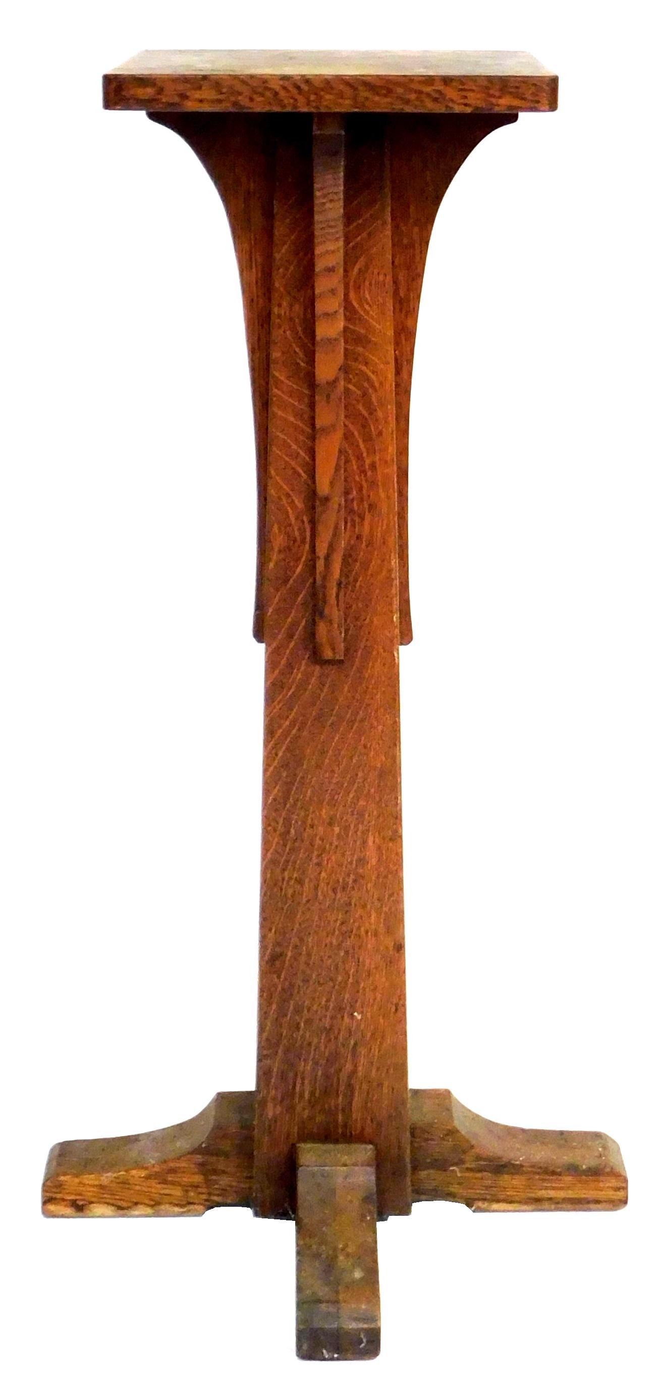 Arts & Crafts pedestal, early 20th C., oak, Mission: Arts & Crafts pedestal, early 20th C., oak, Mission style, square top over corbels and square column standard, four shaped bracket feet, wear consistent with age and use including damages to top, wate