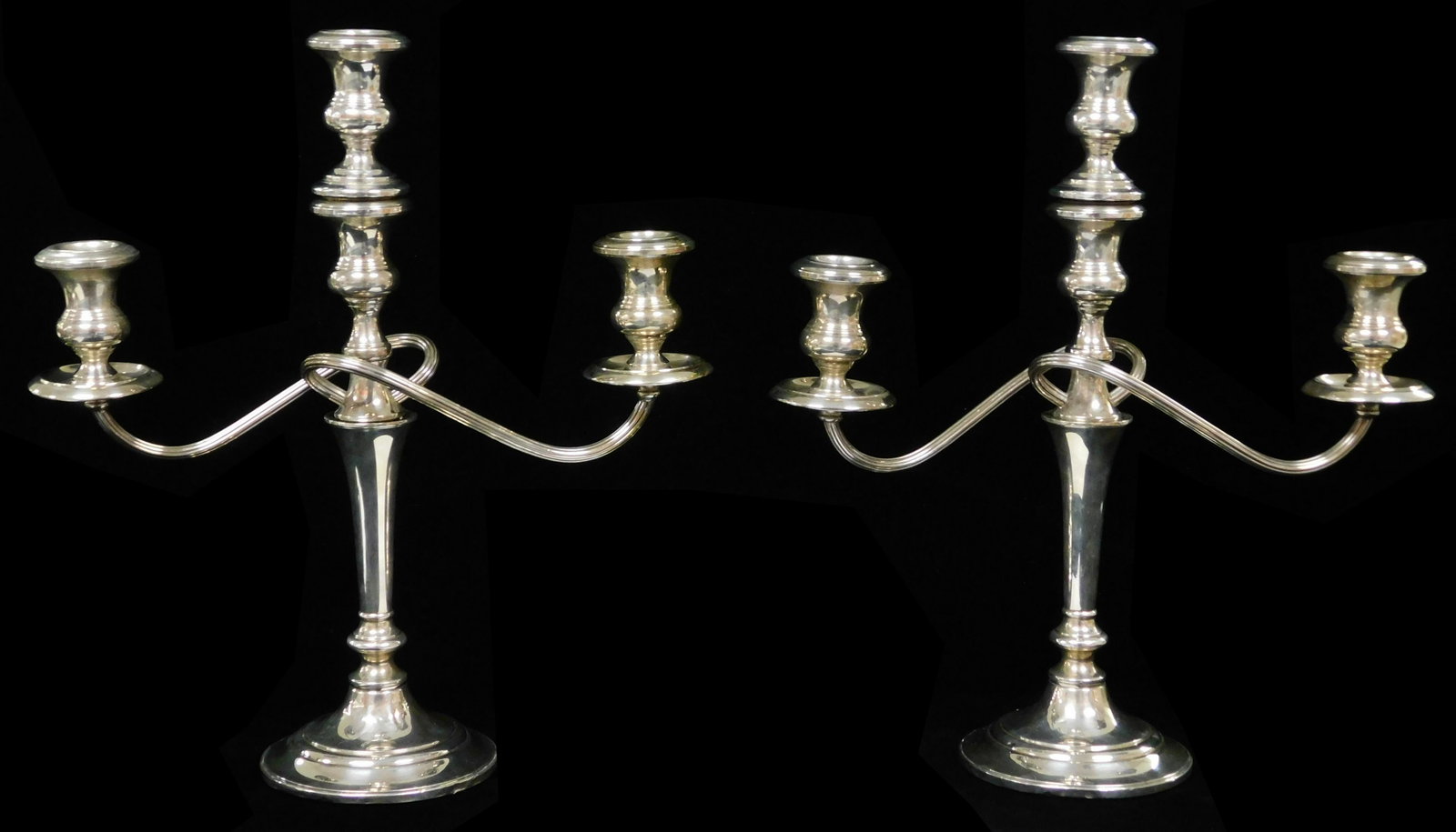 STERLING: Pair of American weighted sterling candelabra: STERLING: Pair of American weighted sterling candelabra by Fisher Silversmiths, Jersey City, NJ, 20th C., adjustable, two arm with ring and reeding decoration, branches or single light, weighted base,