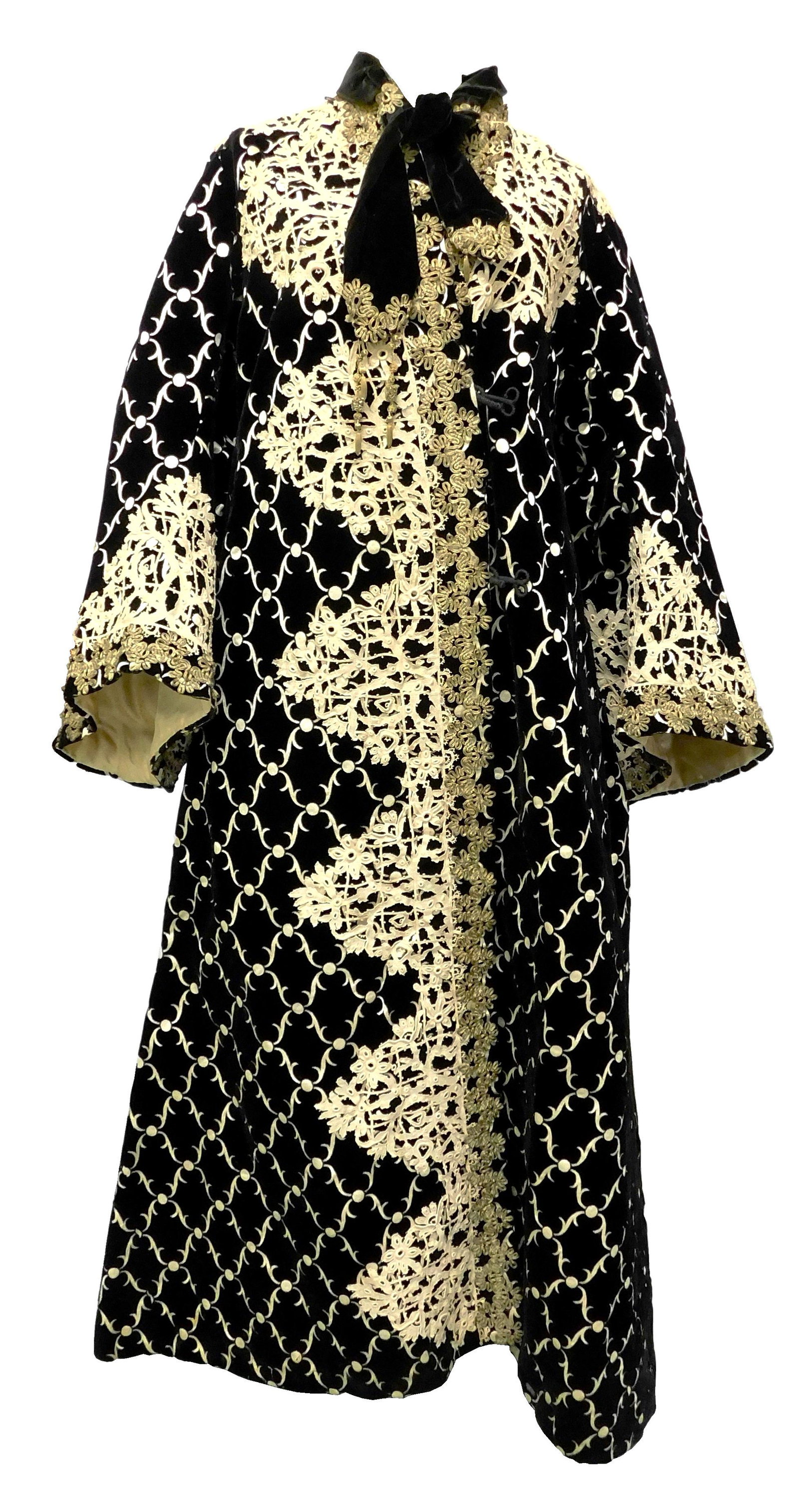 Ladies velvet and satin evening coat, 19th C., museum: Ladies velvet and satin evening coat, 19th C., museum provenance, black cut velvet with white satin background, lined in satin with large inner pocket containing two handkerchiefs, inner waist tie, la