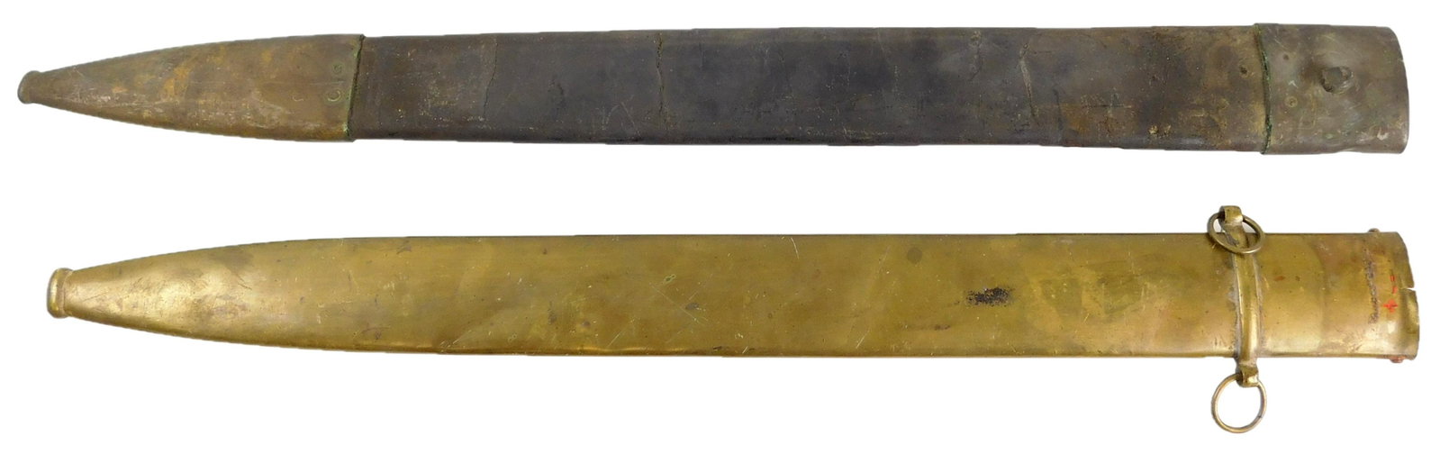 WEAPONS: Pair of sword scabbards: brass artillery: WEAPONS: Pair of sword scabbards: brass artillery officer's scabbard dated 1874, possibly French; brass mounted leather scabbard possibly for the Ames. mfg. Co. artillery officers 1830's sword, good c