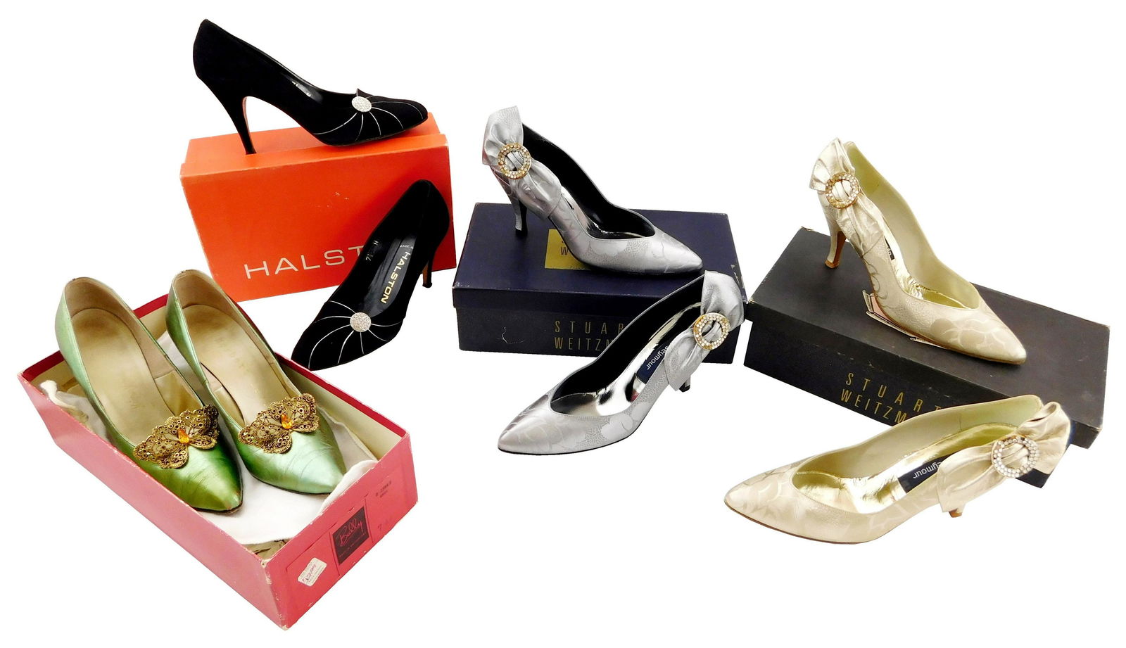 Four pairs of women's heel shoes with embellished: Four pairs of women's heel shoes with embellished accents, two in original boxes, including two Stuart Weitzman metallic with bow and wreath accent, one gold and one silver, both size 8, both with rhi