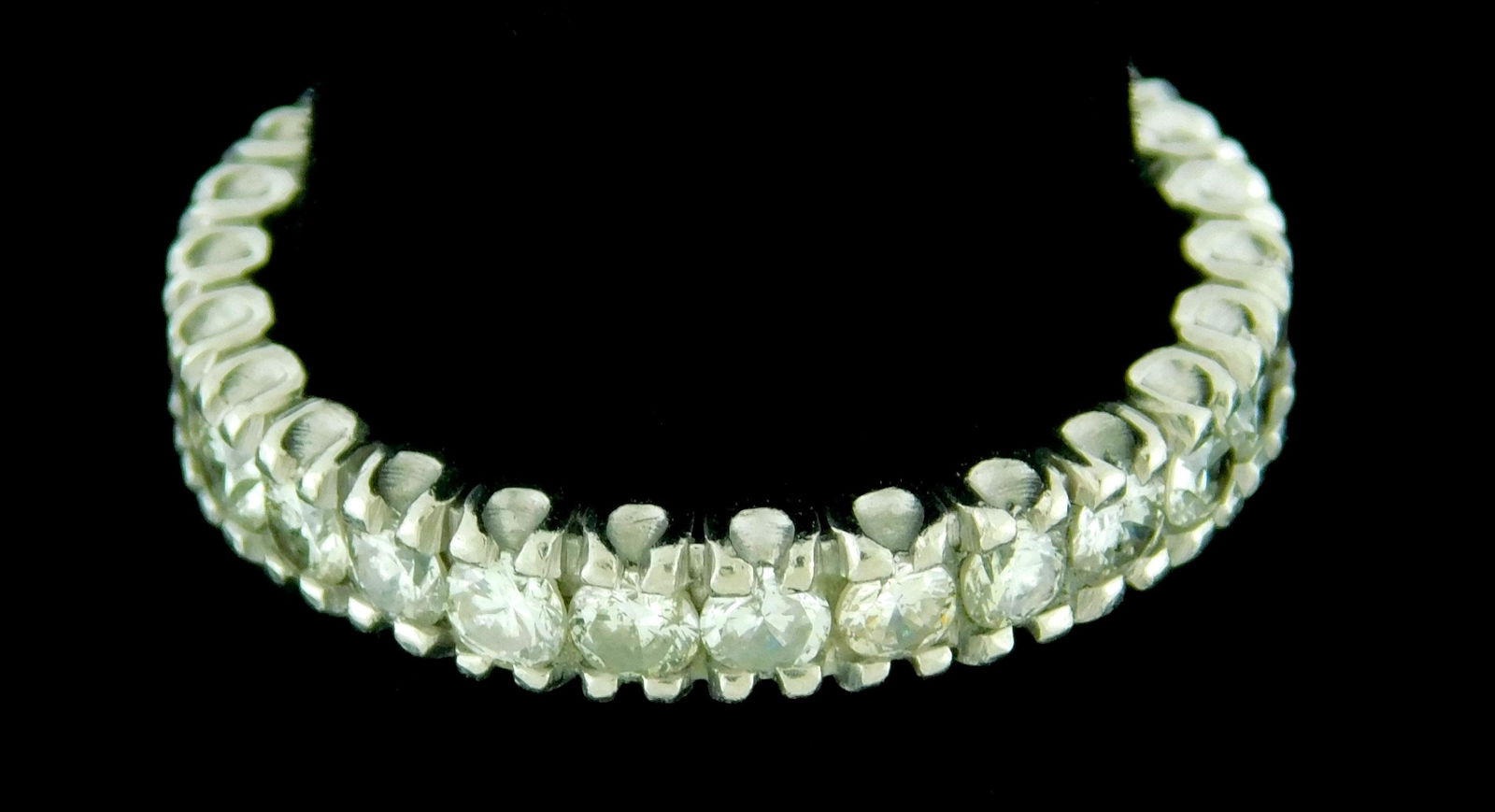 JEWELRY: Platinum and diamond eternity ring, setting: (1 of 2)