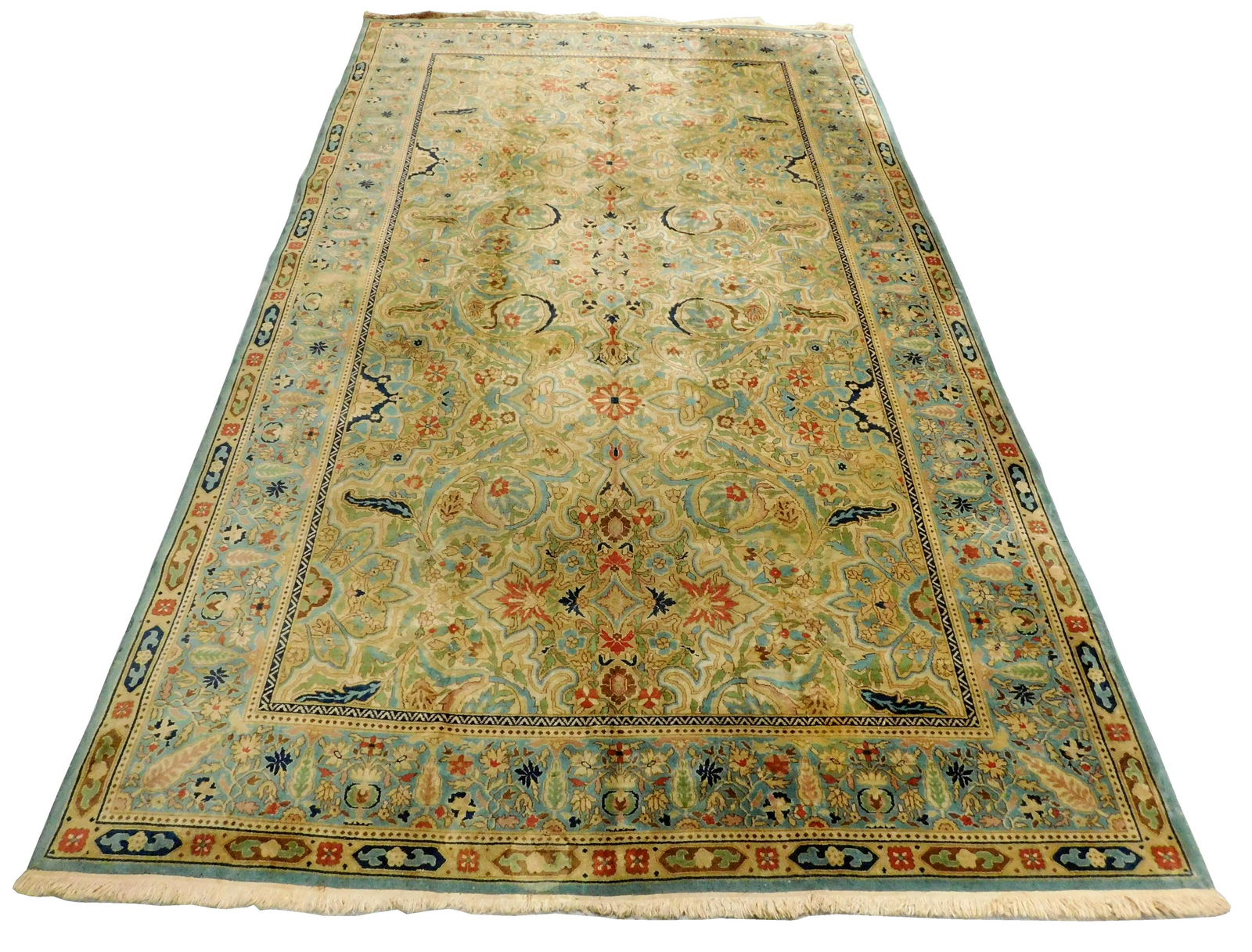 RUG: Semi-Antique Persian style design, 16' 7" x 10',: RUG: Semi-Antique Persian style design, 16' 7" x 10', wool on cotton, machine fringe, wear consistent with age and use, including fringe stain, reinforcement patch, low and worn areas, staining to bac