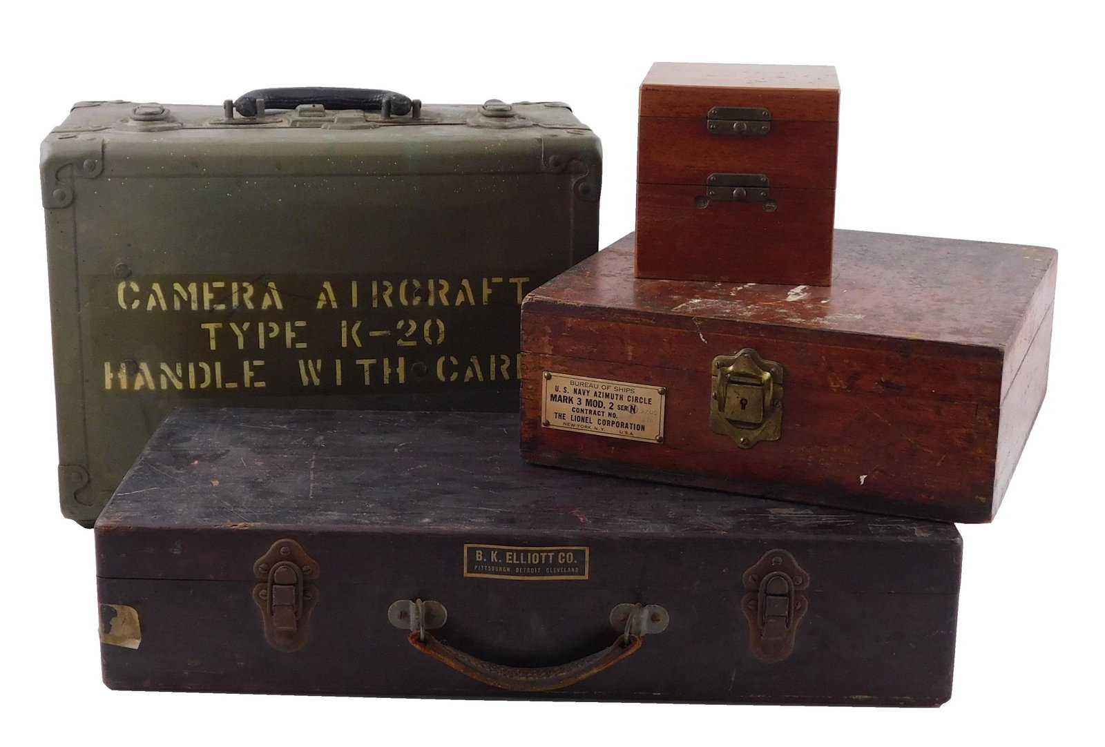 Four American military instruments, WWII era, all in: Four American military instruments, WWII era, all in original cases, including K20 aircraft camera, serial number AC-42-69791, with red and yellow filters and film threading plate; aircraft plotter, m